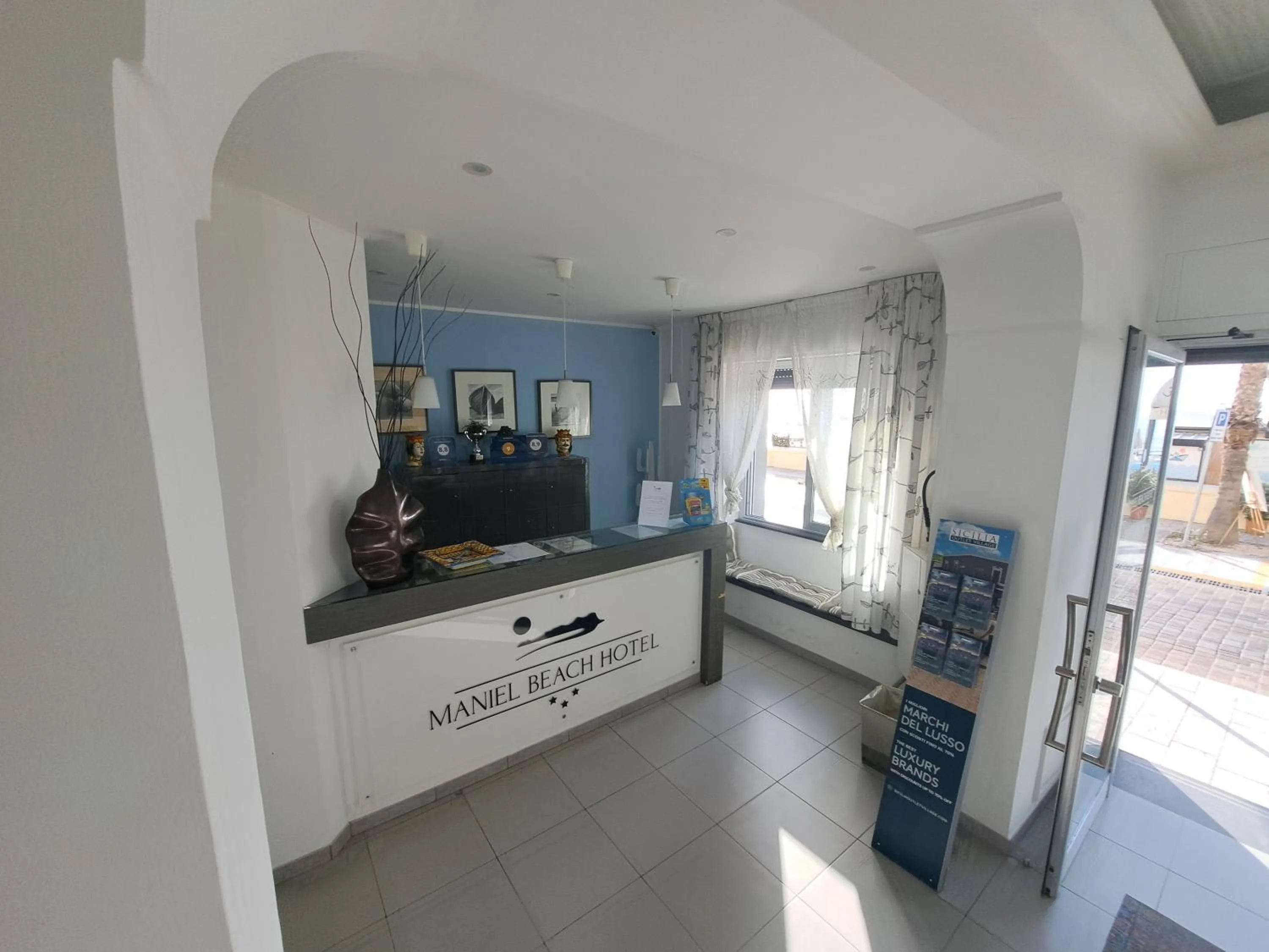 Lobby or reception in Maniel Beach Hotel