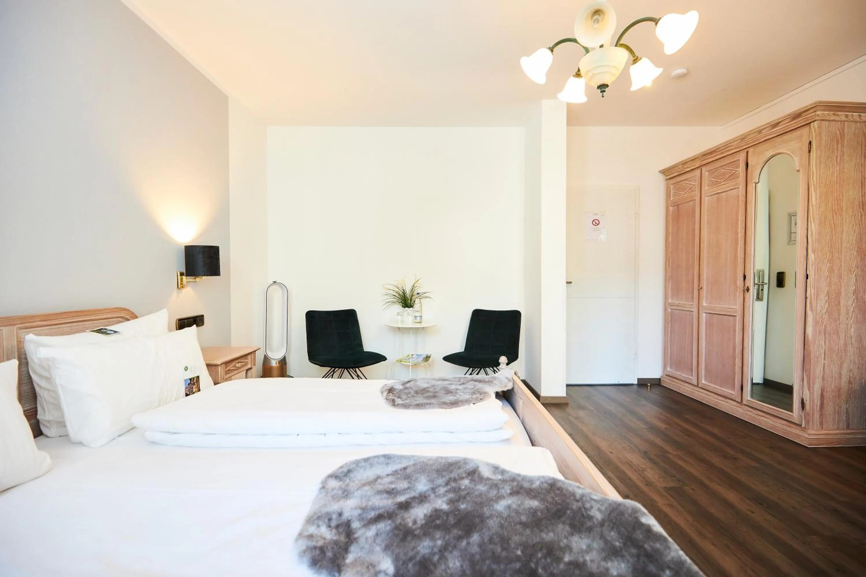 Photo of the whole room, Bed in Flair Hotel Vier Jahreszeiten