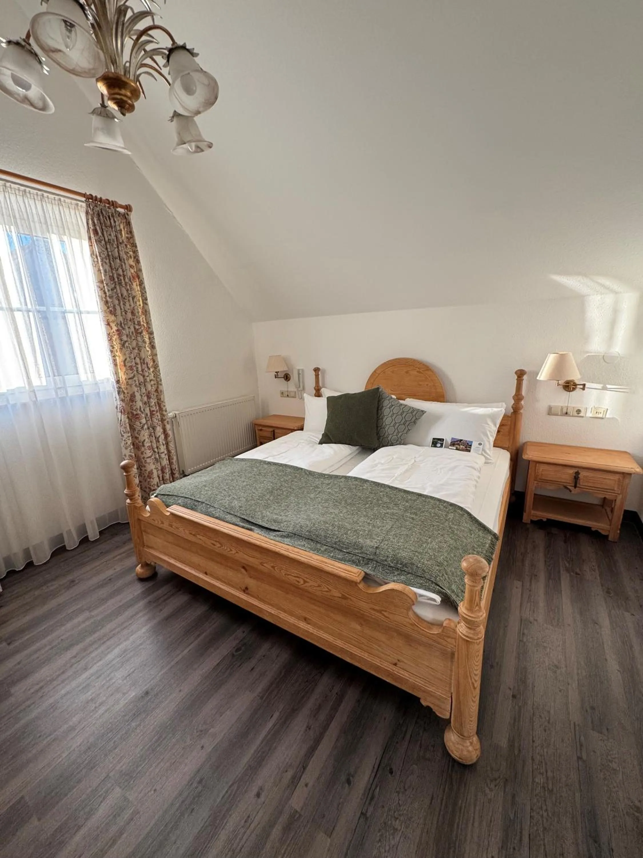 Photo of the whole room, Bed in Flair Hotel Vier Jahreszeiten