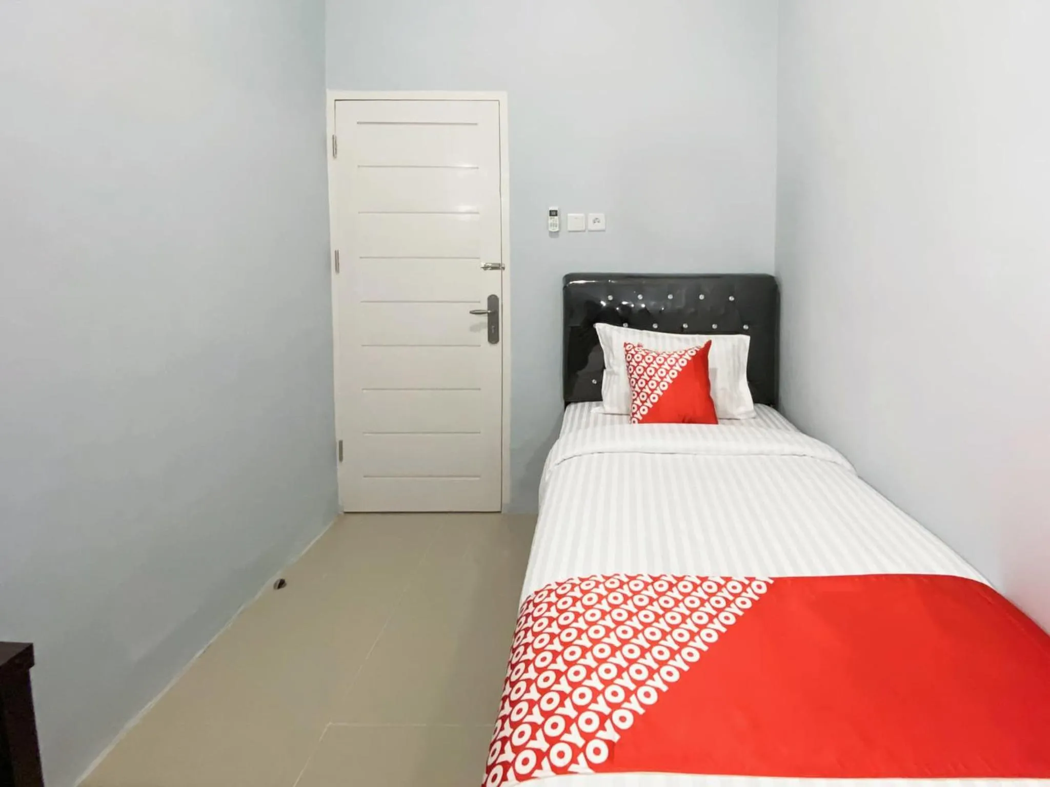 Bedroom in Hotel O Guesthouse Pagi Sore Syariah