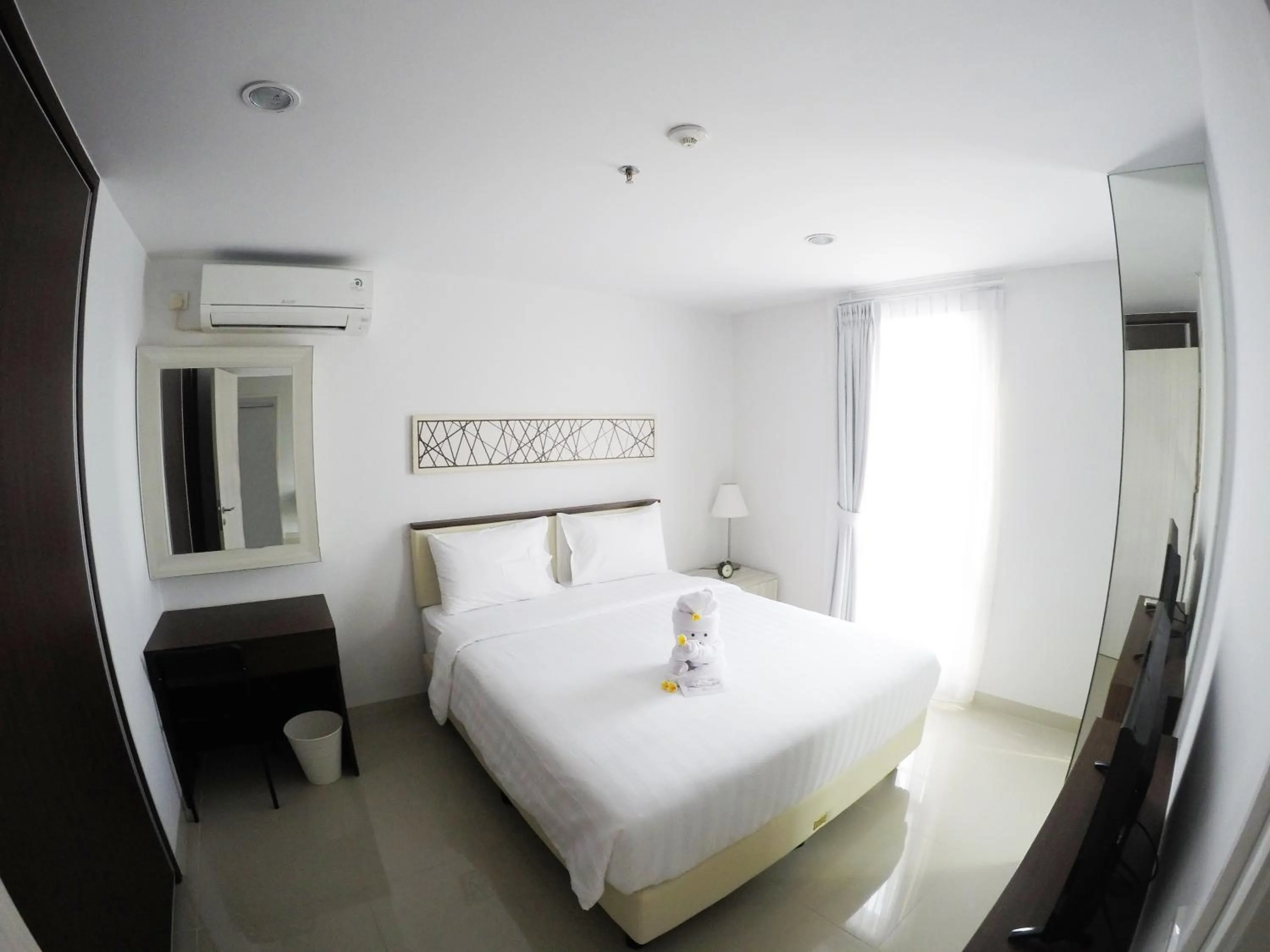 Photo of the whole room, Bed in Azalea Suites Cikarang by Jayakarta Group