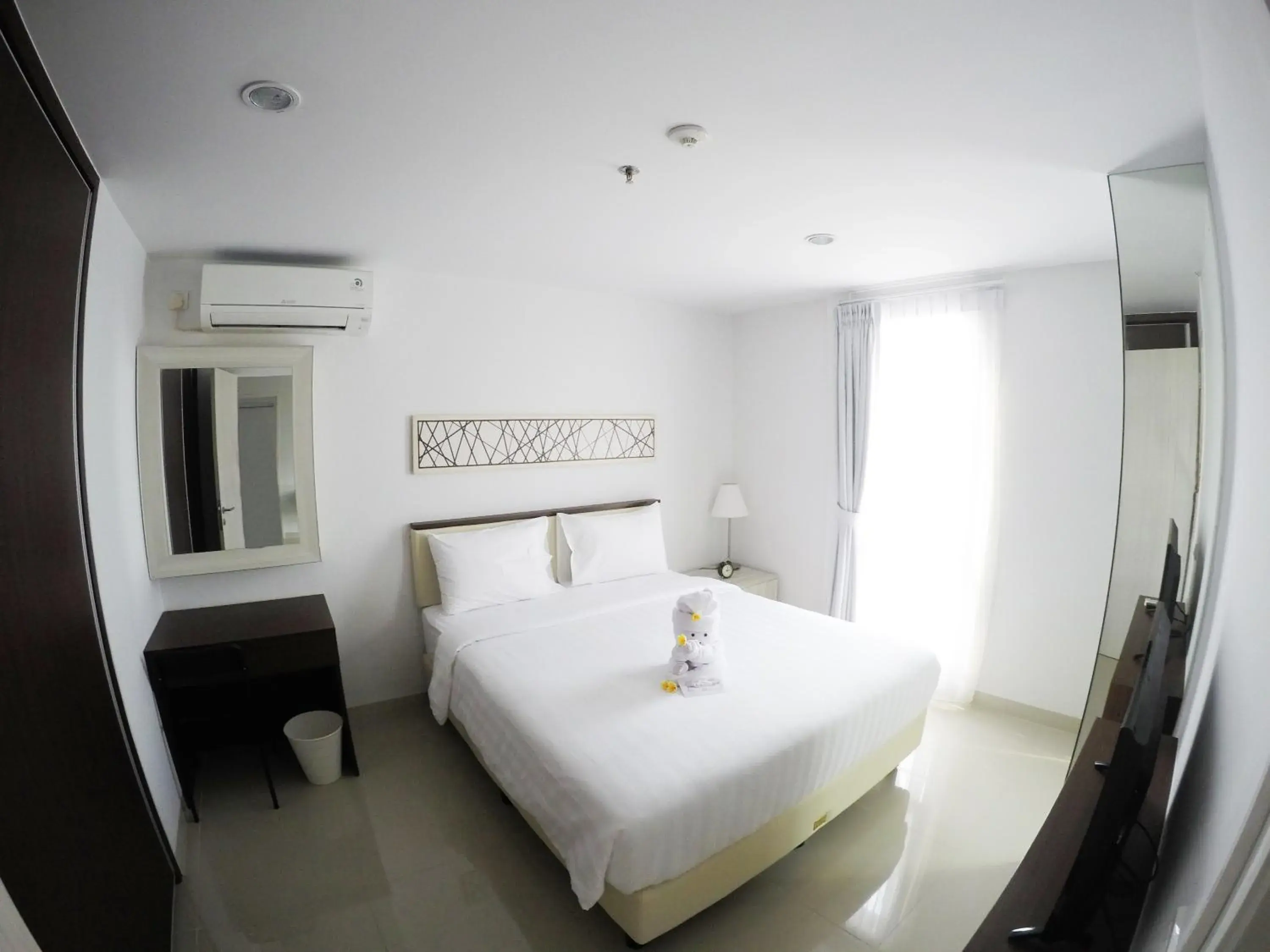 Photo of the whole room, Bed in Azalea Suites Cikarang by Jayakarta Group Photo of the whole room, Bed in Azalea Suites Cikarang by Jayakarta Group