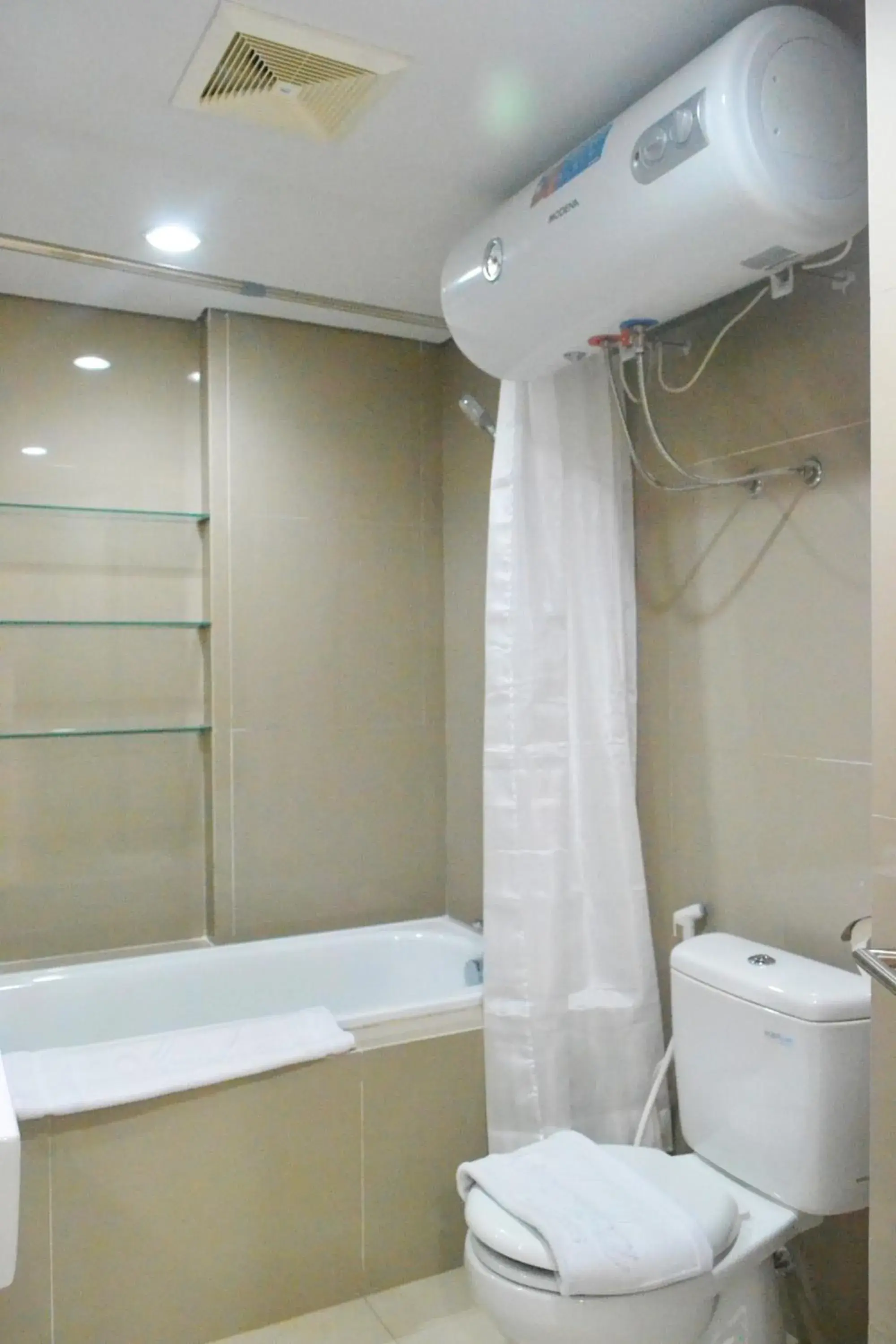 Bathroom in Azalea Suites Cikarang by Jayakarta Group Bathroom in Azalea Suites Cikarang by Jayakarta Group