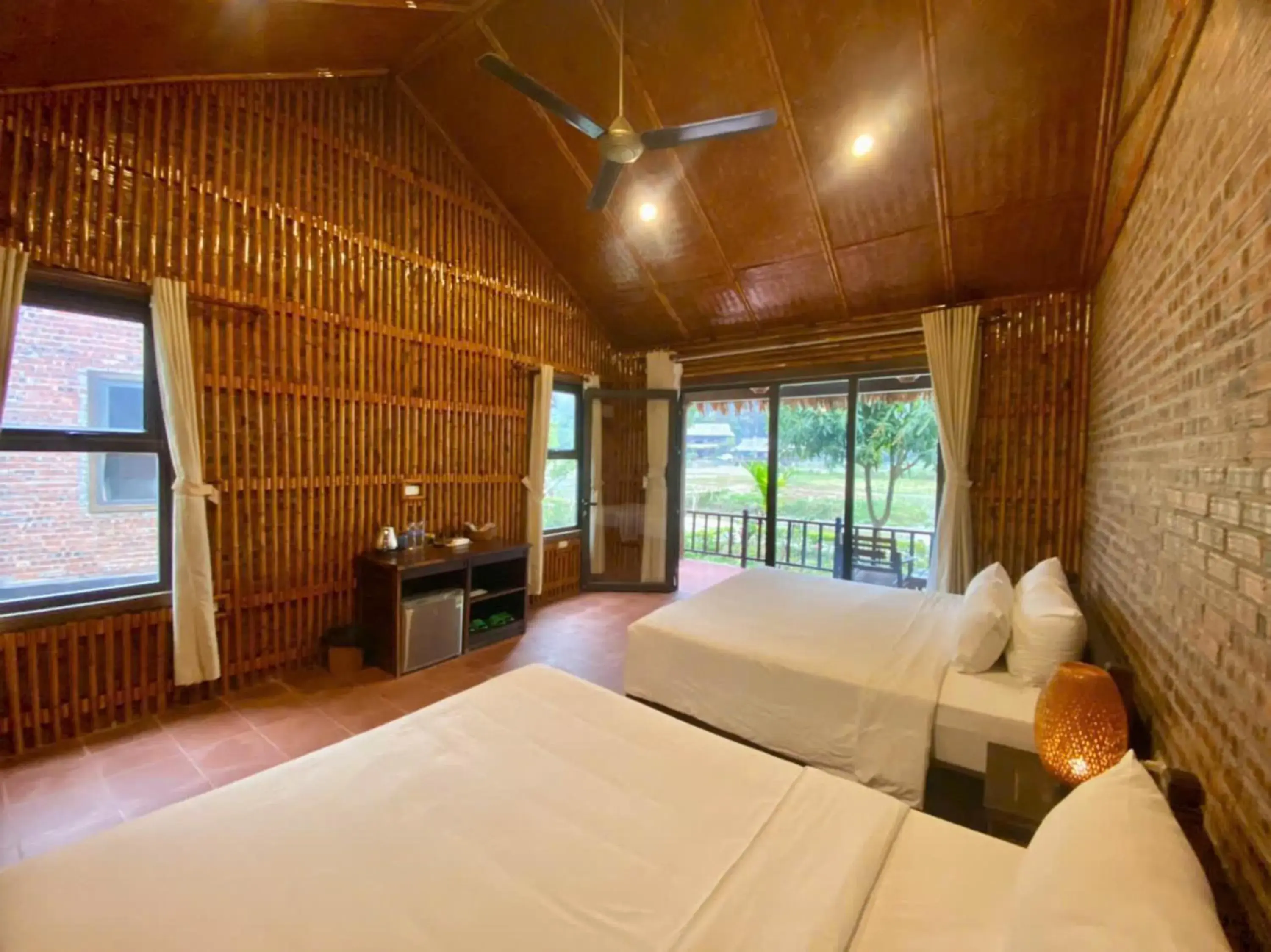 Family Room with Balcony in Mường Village Ninh Bình Family Room with Balcony in Mường Village Ninh Bình