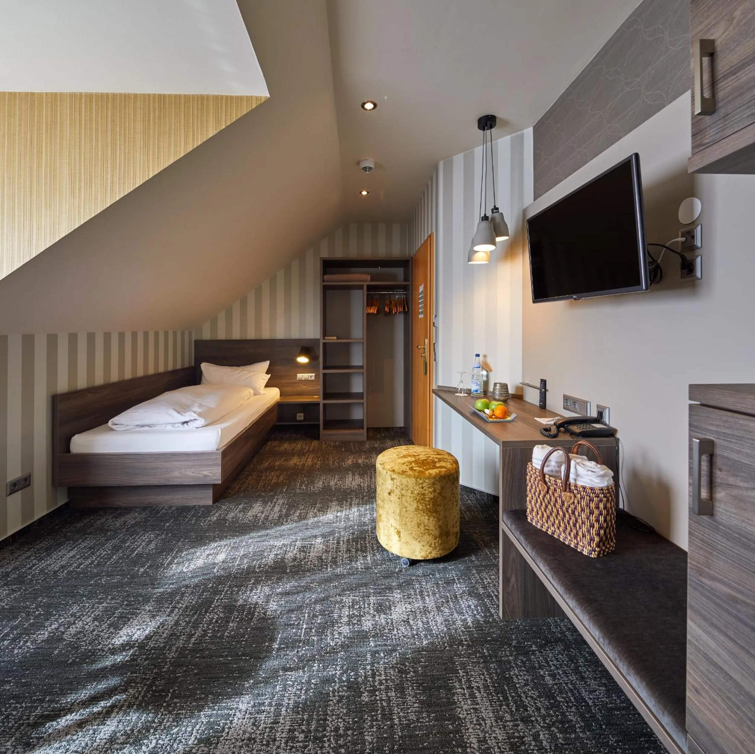 Bed in NaturKulturHotel Stumpf