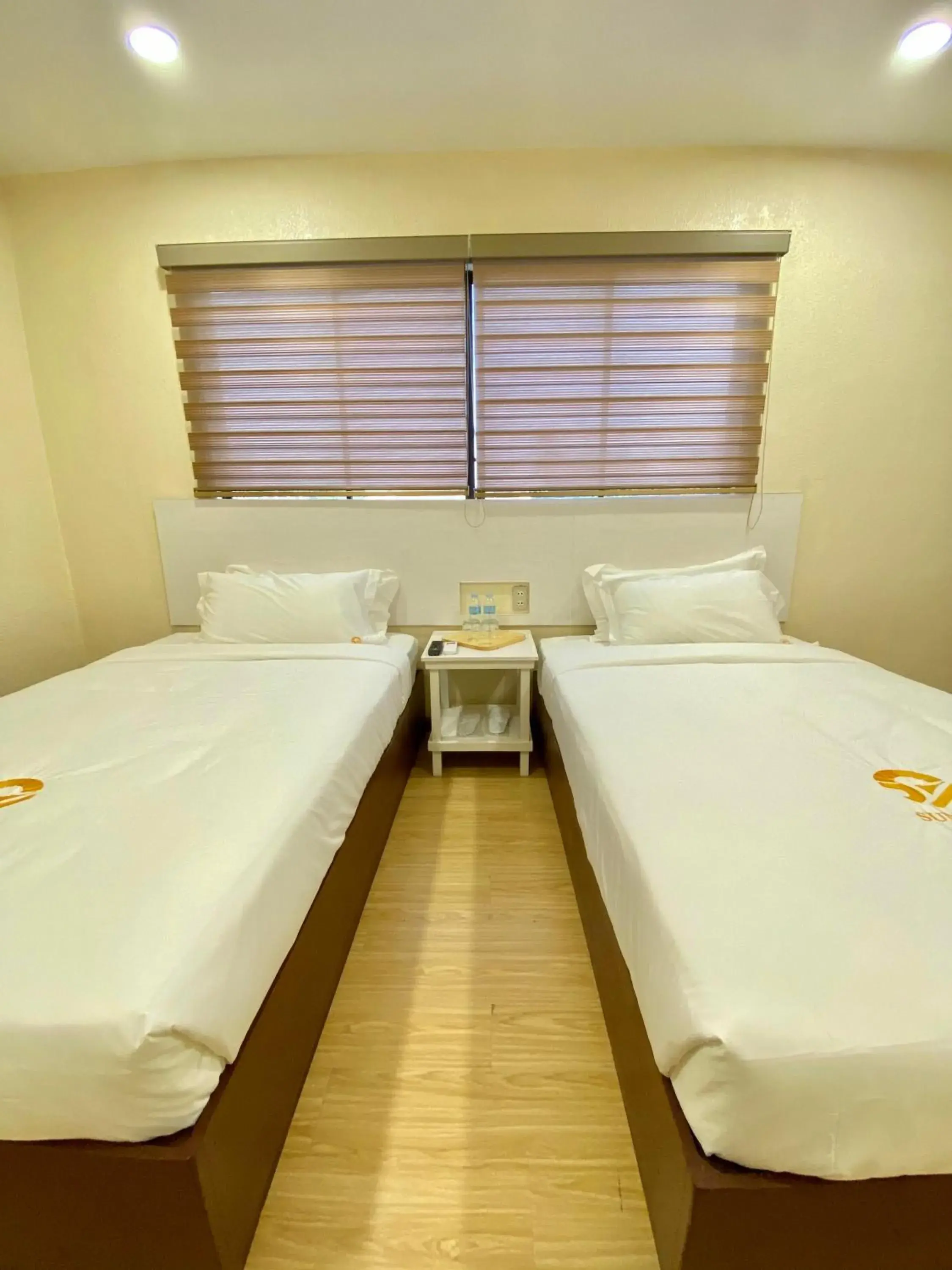 Bed in SUN MY HOTEL Bed in SUN MY HOTEL