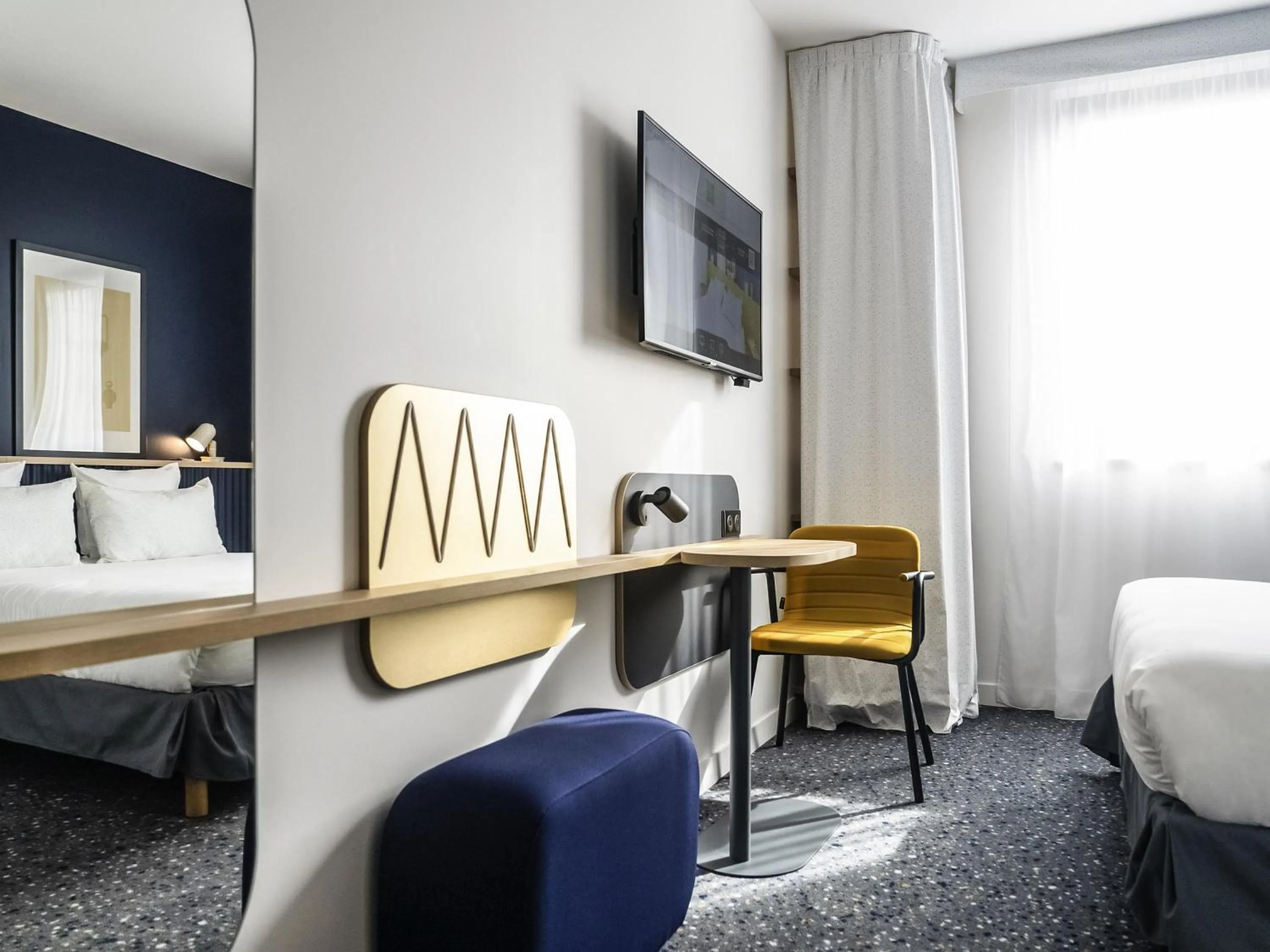 Bedroom in ibis Styles Paris Romainville