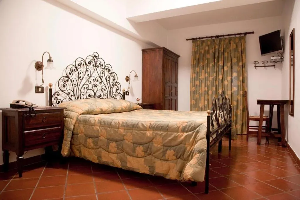 Bed in Hotel Bucaneve