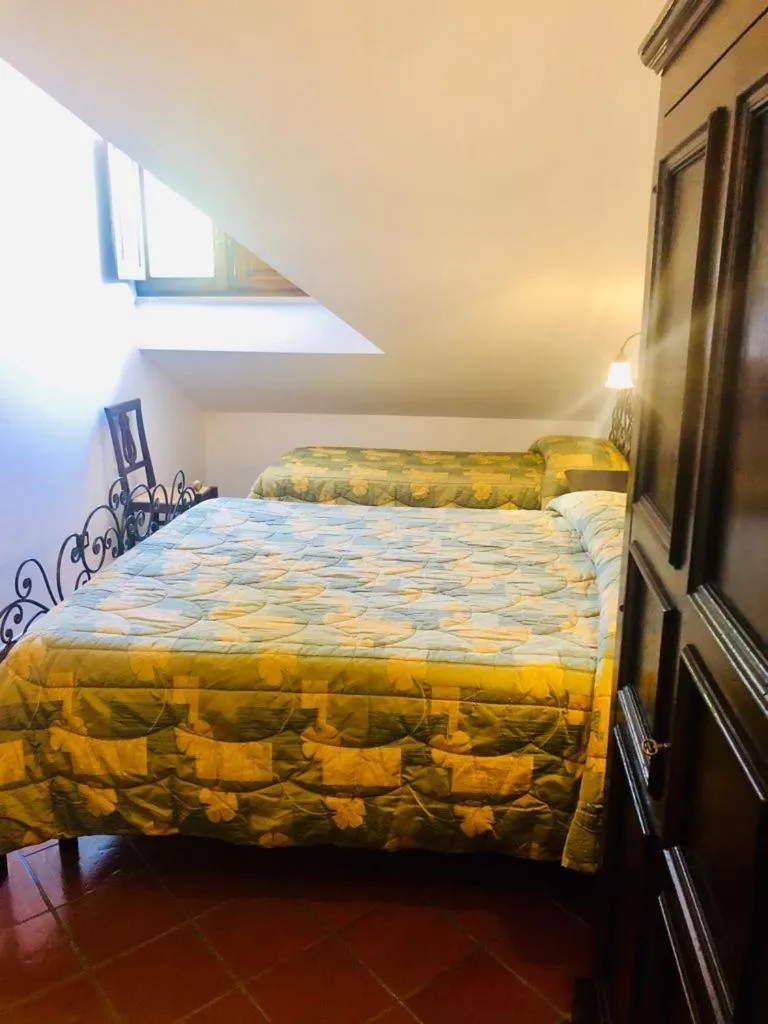 Bed in Hotel Bucaneve