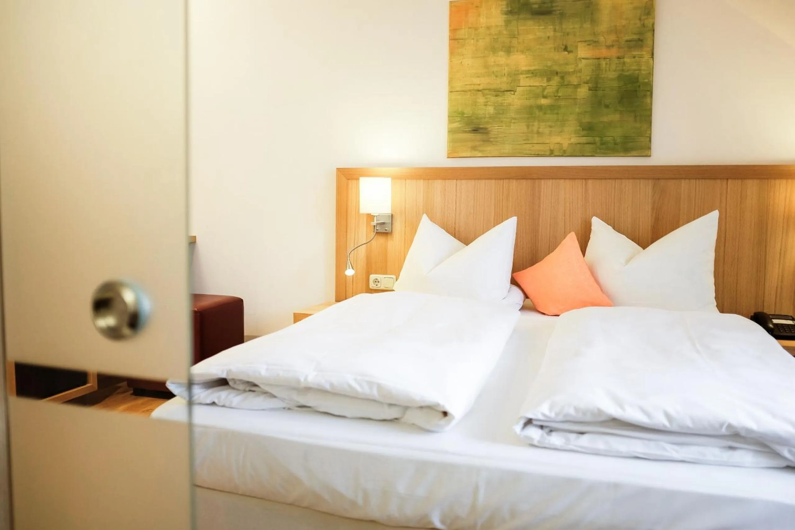 Bed in Romantik Hotel Hirschen