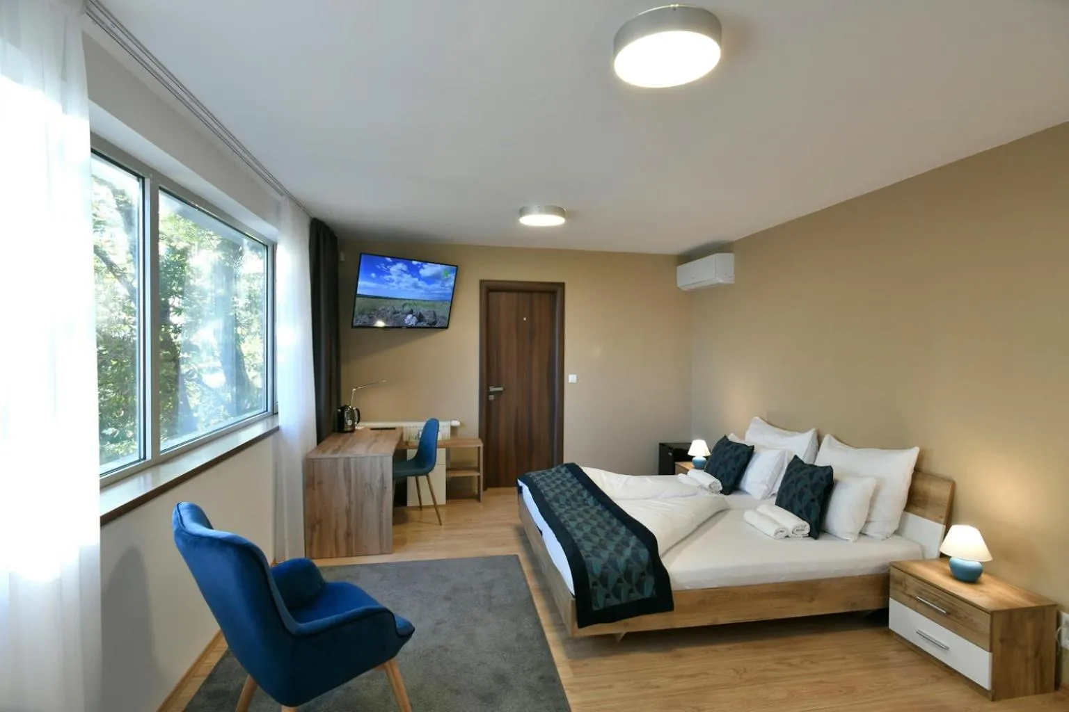 Bed in River View Apartments Hotel