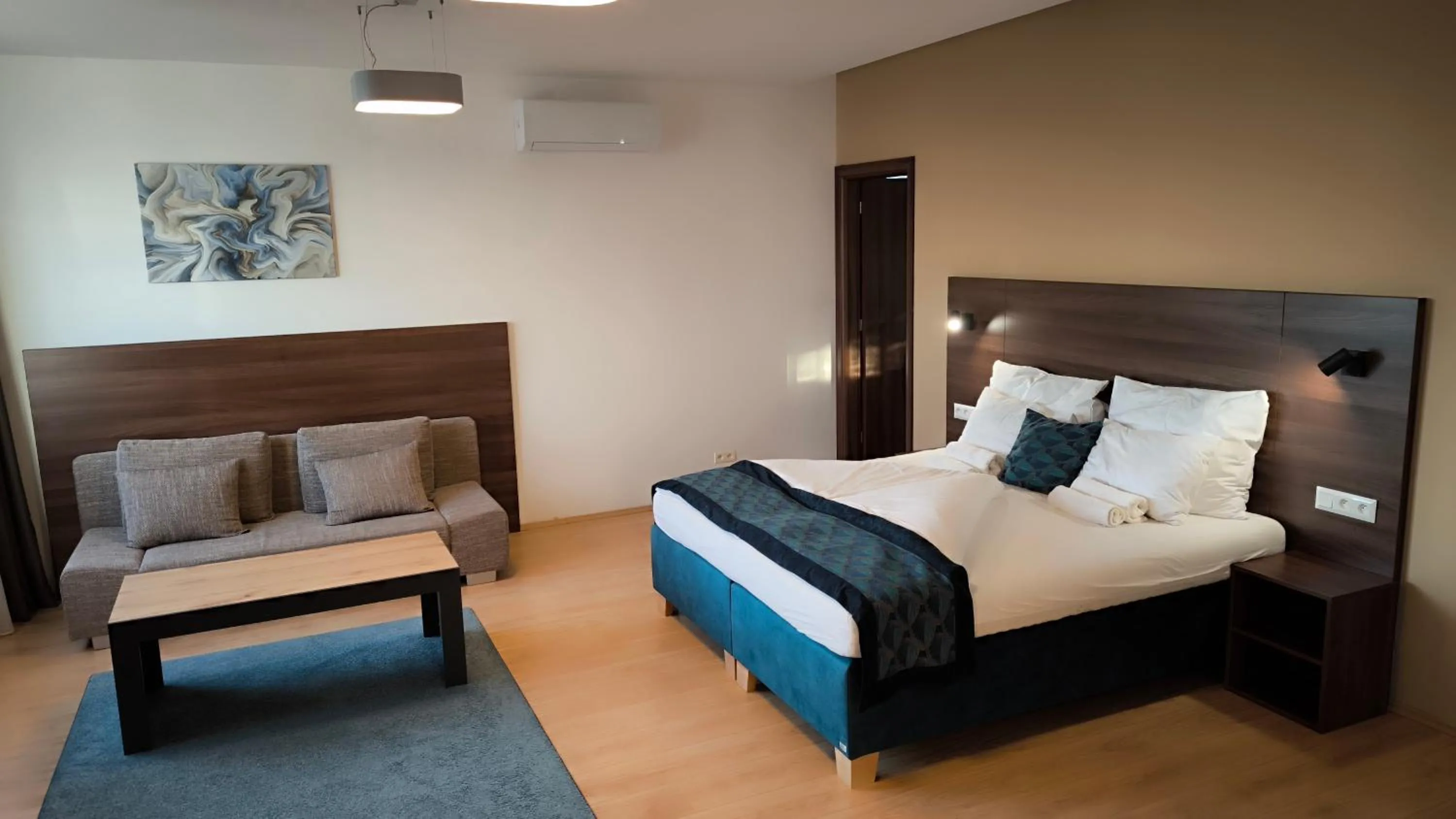 Bed in River View Apartments Hotel