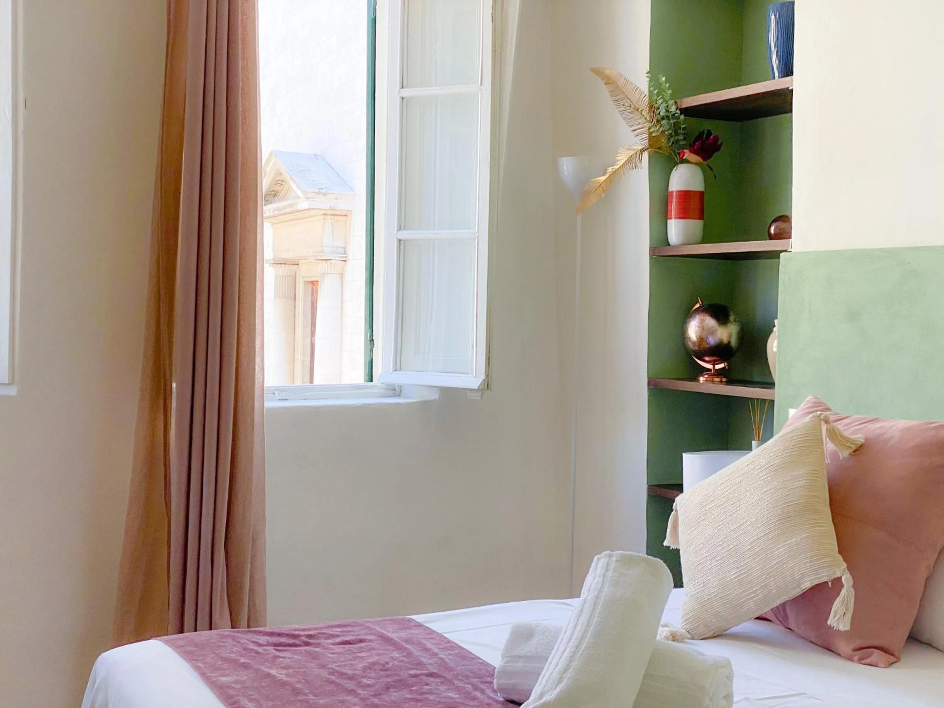 Bed in OROROSA Lucca City Center Apartment