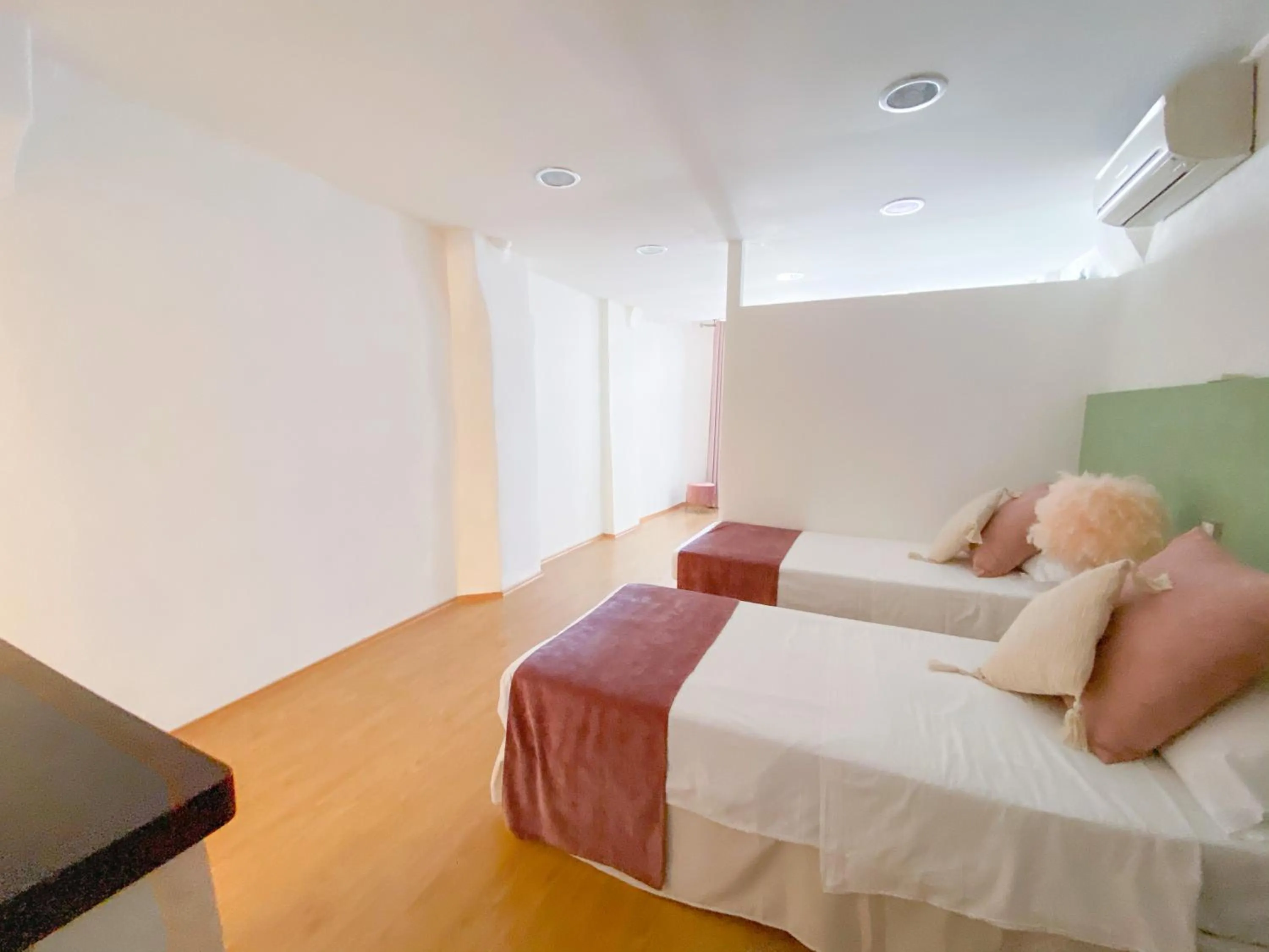 Bed in OROROSA Lucca City Center Apartment