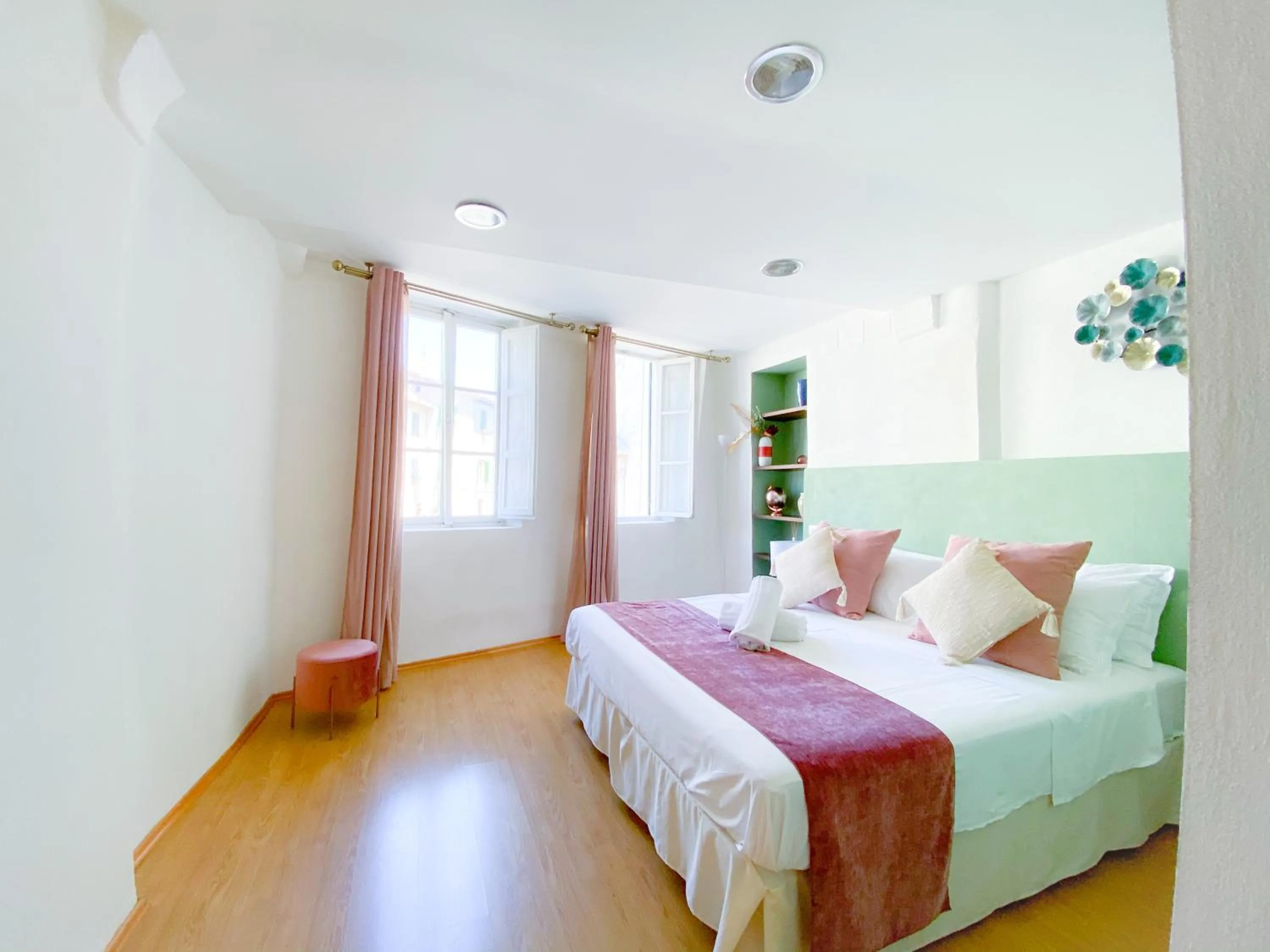 Bed in OROROSA Lucca City Center Apartment