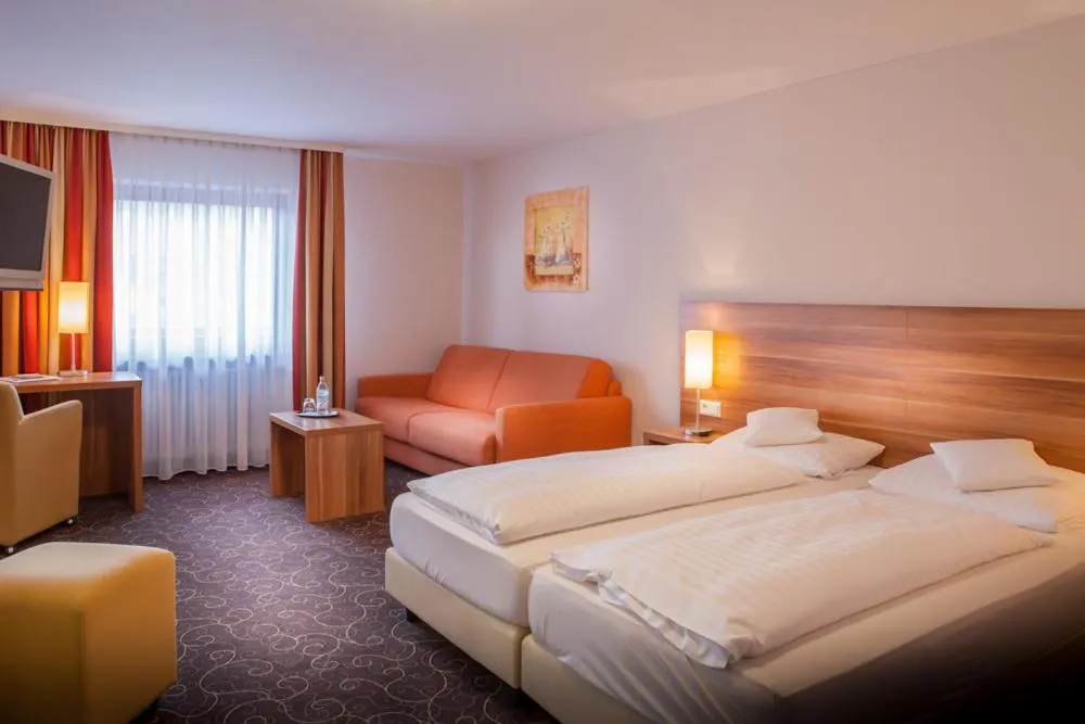 Photo of the whole room, Bed in Flair Hotel Weinstube Lochner