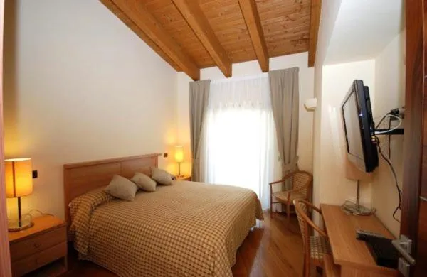 Photo of the whole room, Bed in Tassido Coda Resort