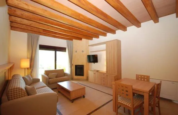 Communal lounge/ TV room in Tassido Coda Resort