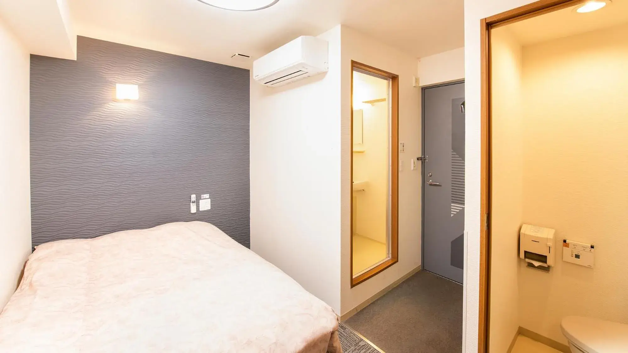 Bed in Yokohama Town Hotel Bed in Yokohama Town Hotel