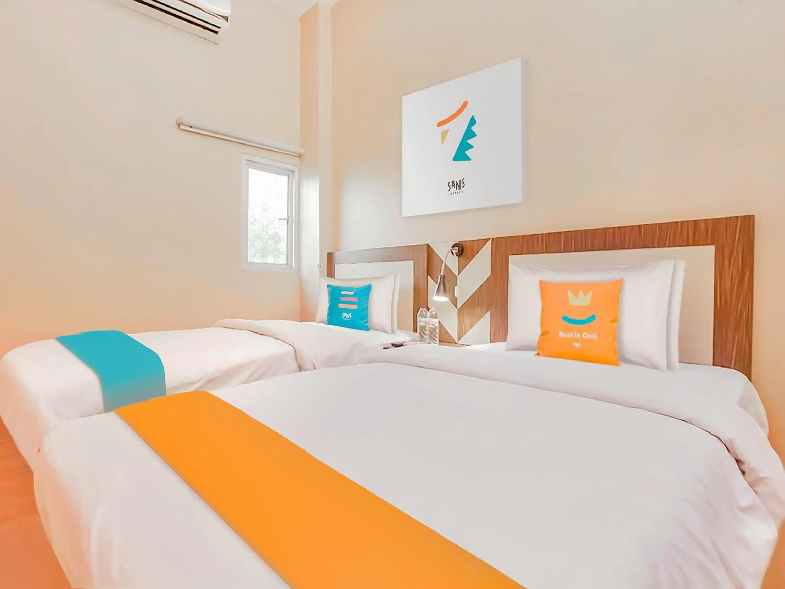 Bedroom, Bed in Sans Hotel City Inn Palangkaraya