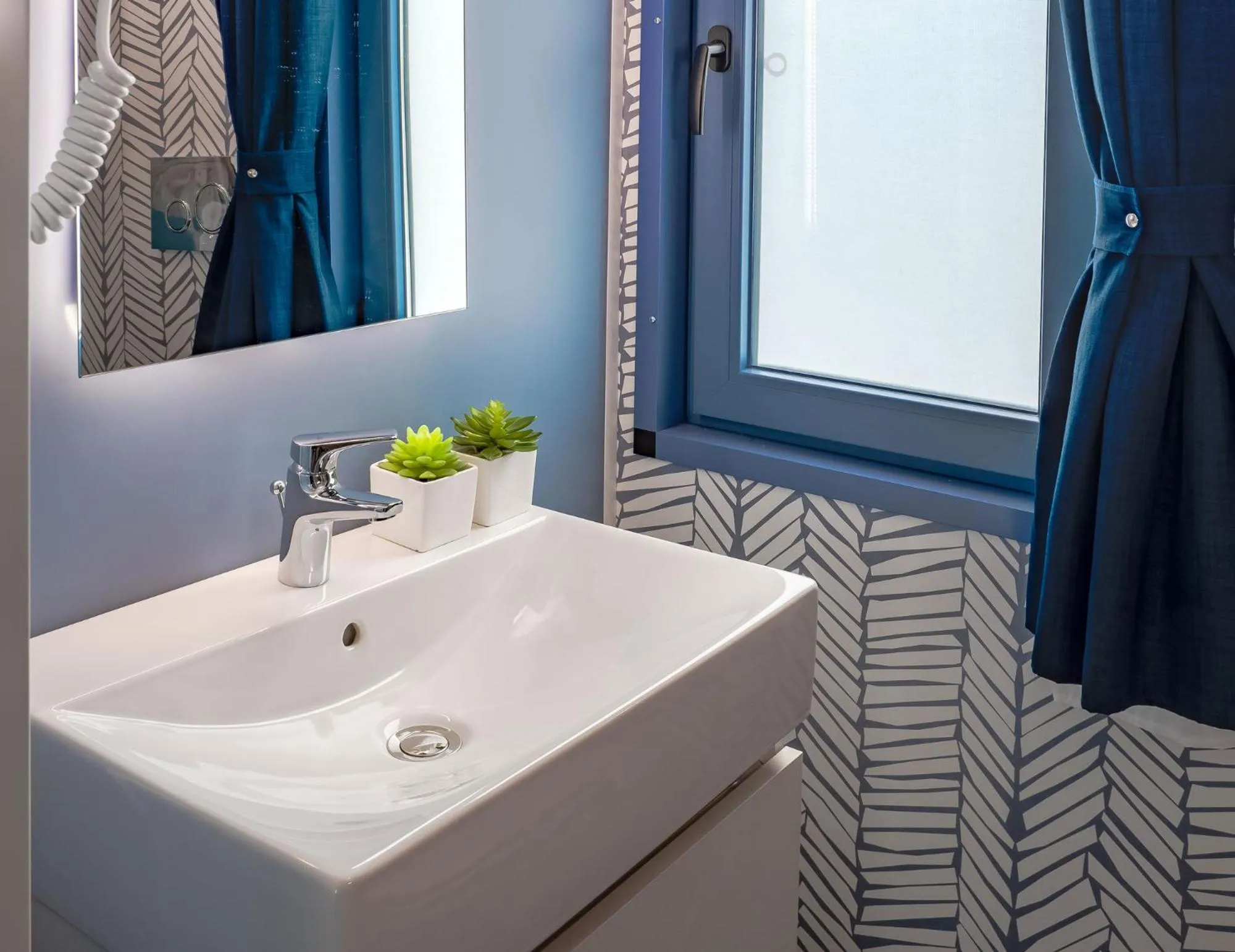 Bathroom in Club del Sole Rimini Family Resort