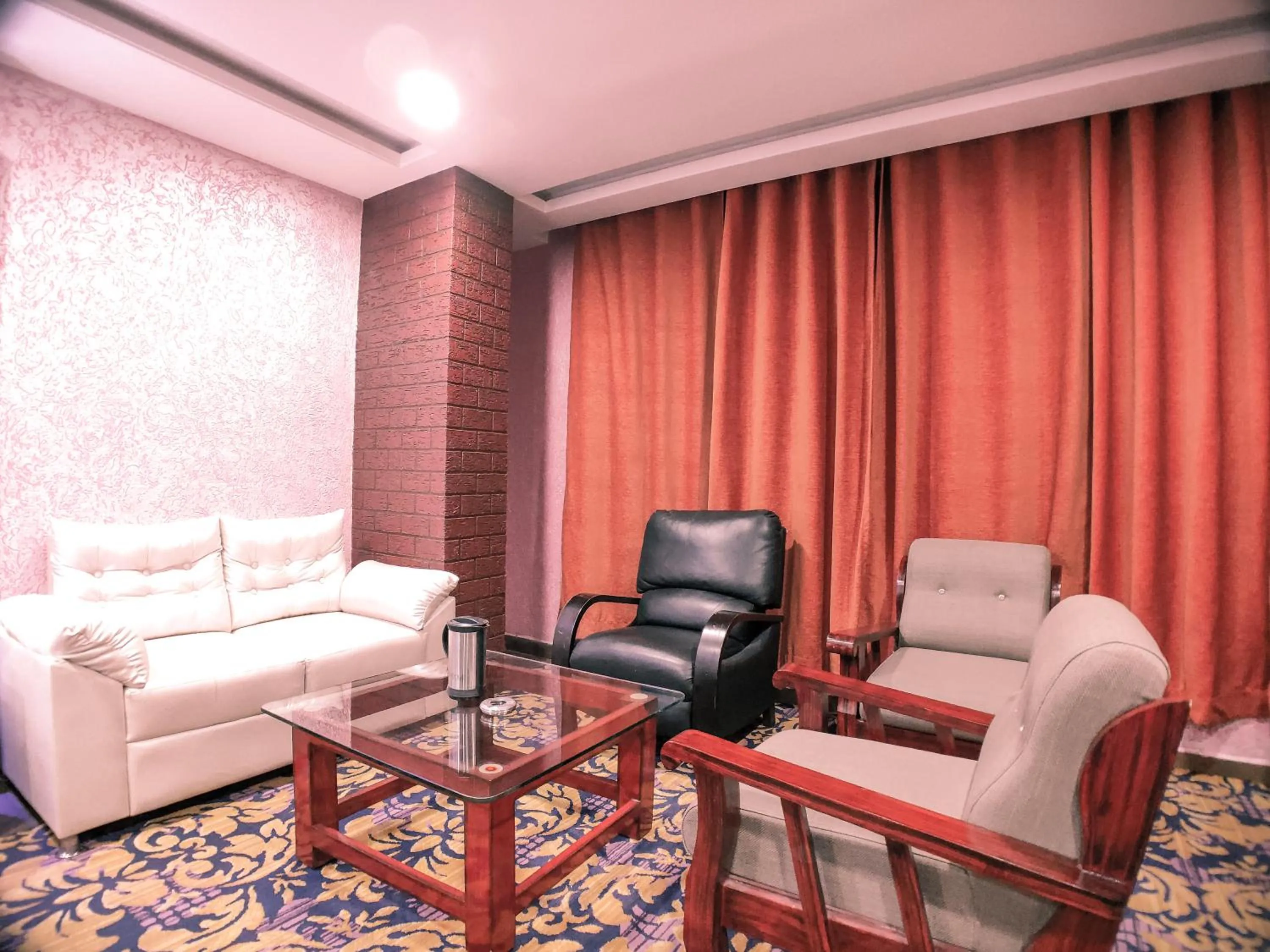 Seating area in Hotel Vishnu Empire