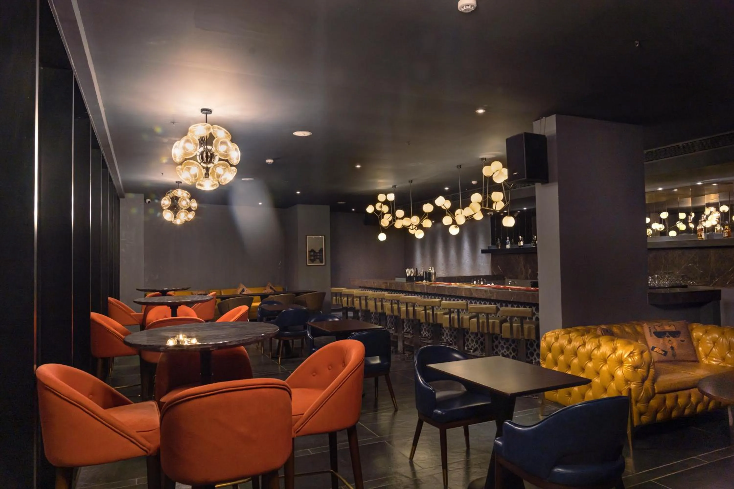 Lounge or bar in The Elite Narasapura, a member of Radisson Individuals