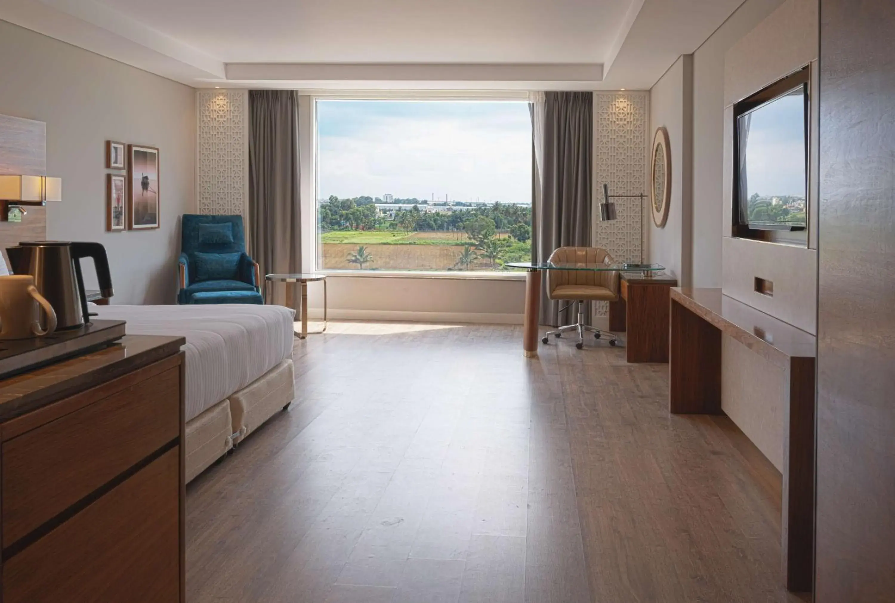 Photo of the whole room, Bed in The Elite Narasapura, a member of Radisson Individuals Photo of the whole room, Bed in The Elite Narasapura, a member of Radisson Individuals