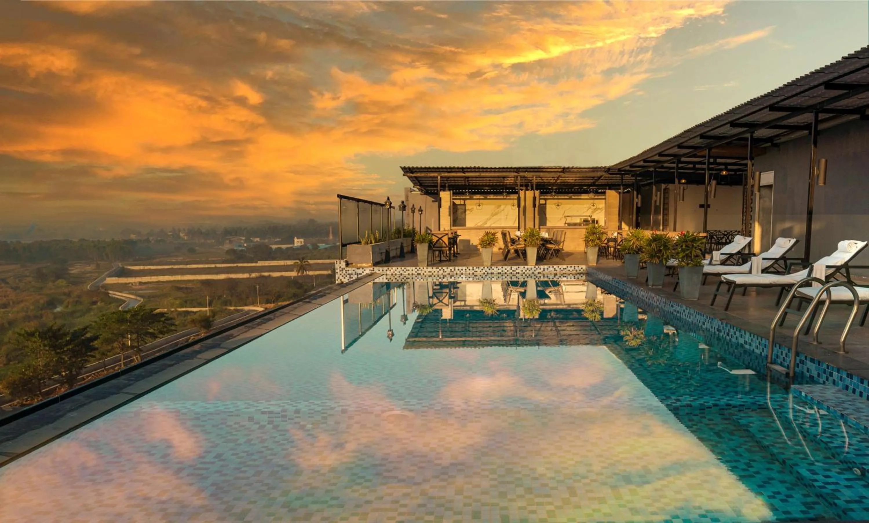 Pool view in The Elite Narasapura, a member of Radisson Individuals