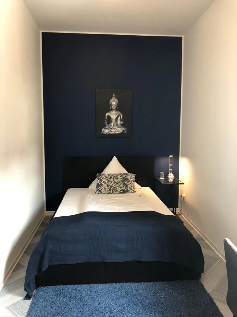 Photo of the whole room, Bed in bensons hotel