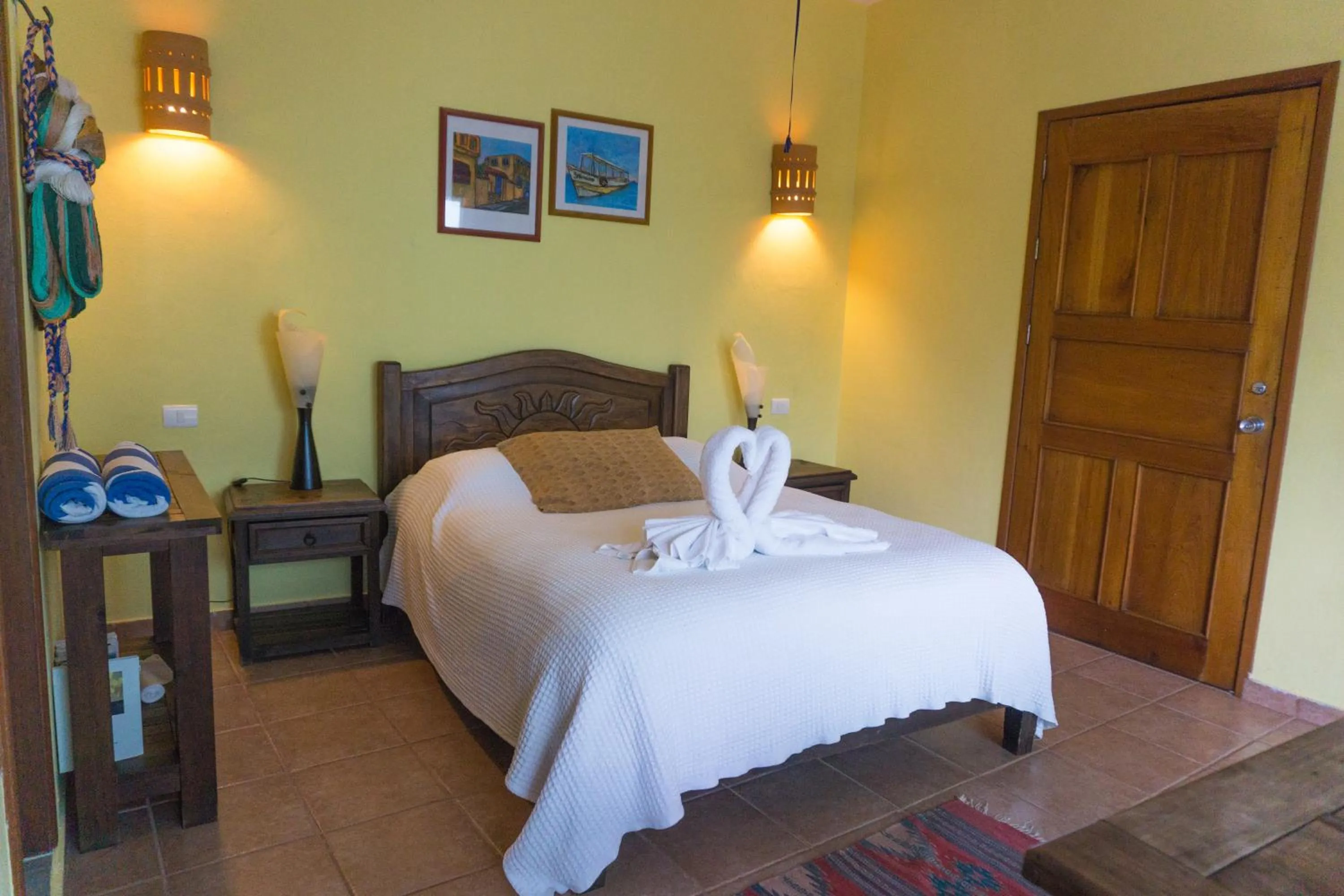 Bed in Sea Hawk Suites