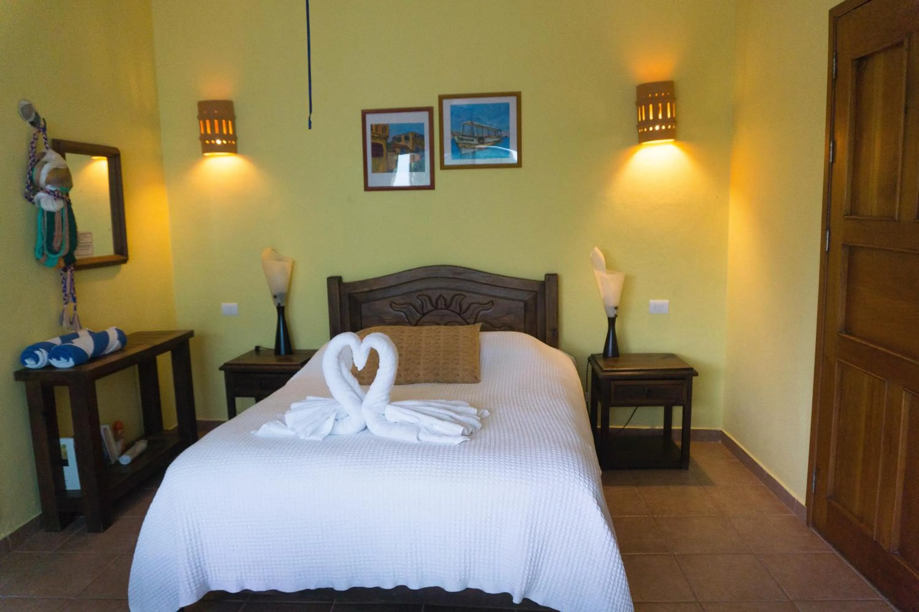 Bed in Sea Hawk Suites