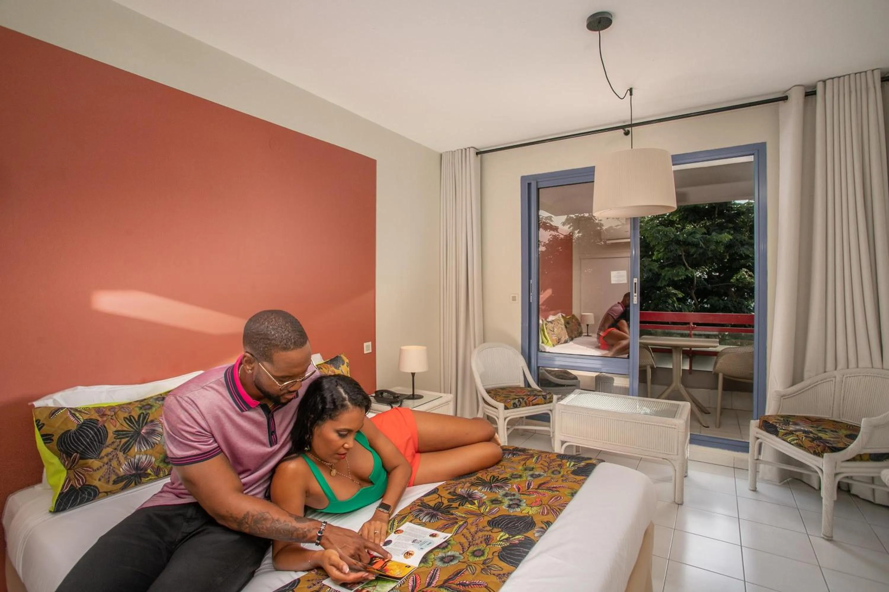 Bed in Karibea Squash Hôtel