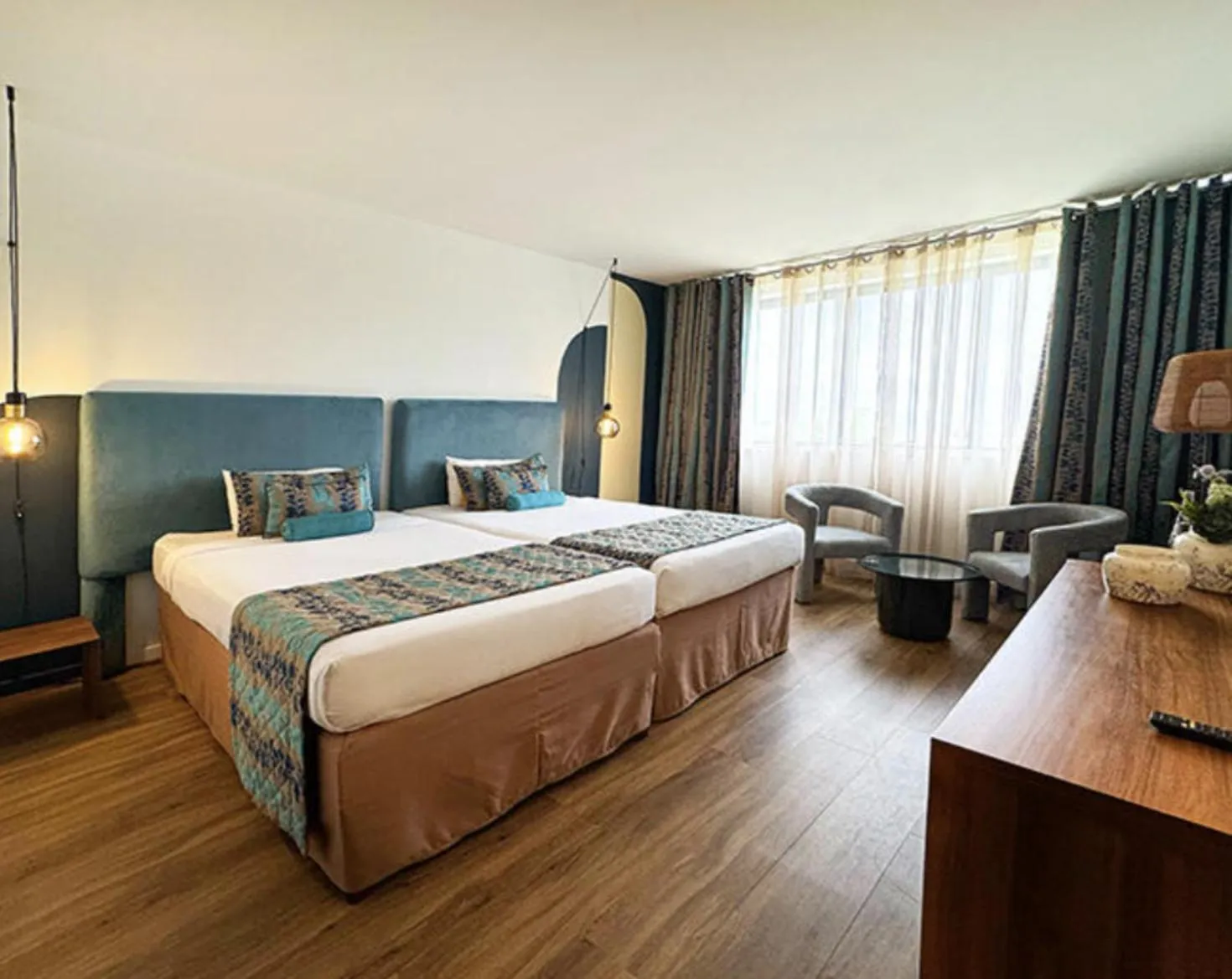 Photo of the whole room, Bed in Karibea La Valmenière Hôtel