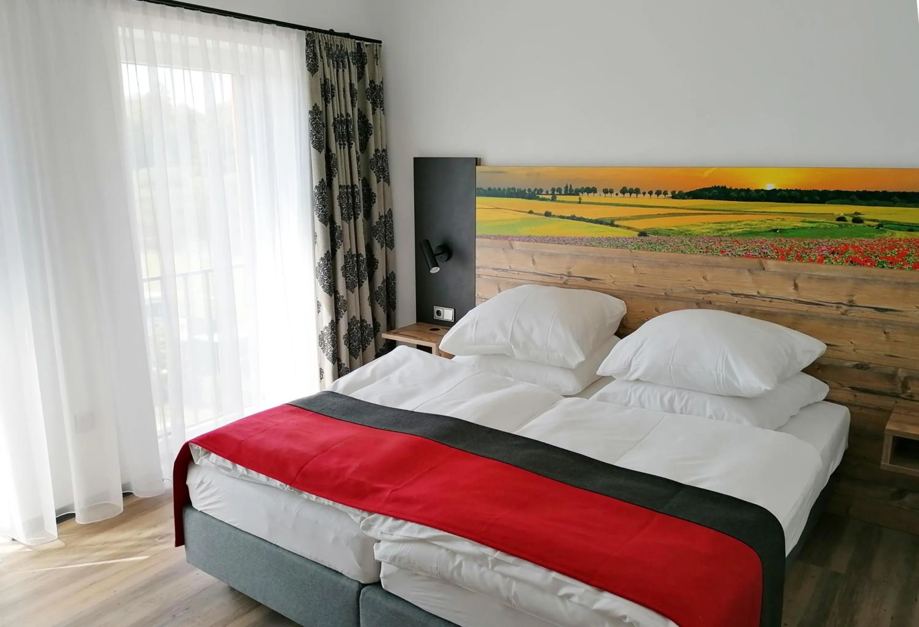 Photo of the whole room, Bed in Hotel Grohnder Fährhaus