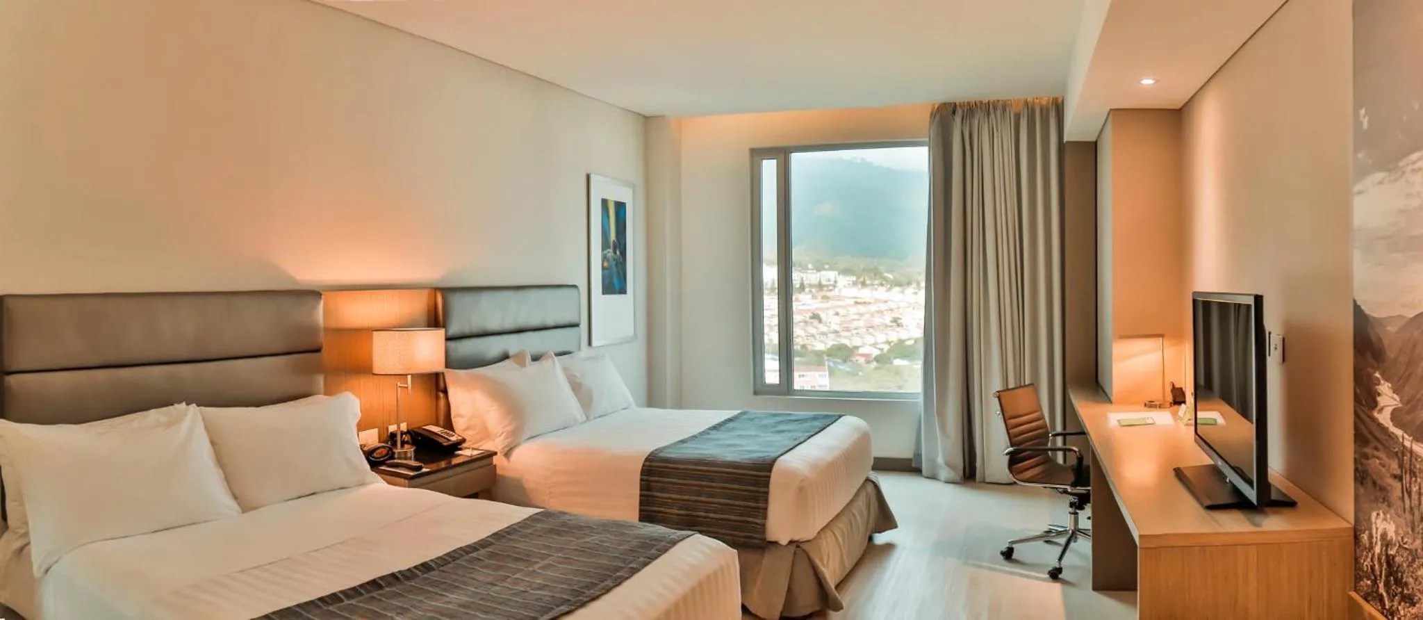 Photo of the whole room, Bed in Holiday Inn Bucaramanga Cacique by IHG