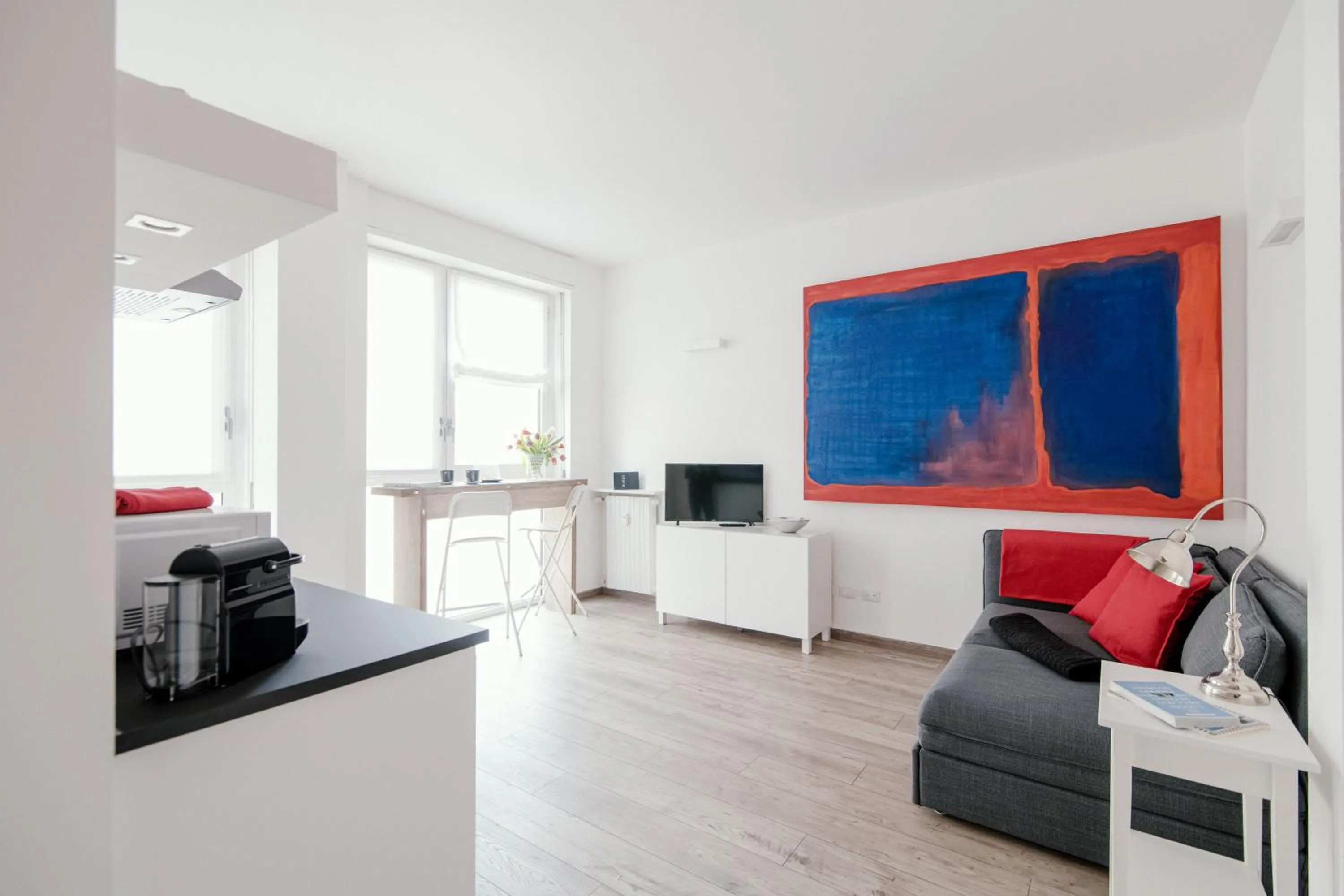 Living room in Mark's Gallery Apartment by MyHomeInComo