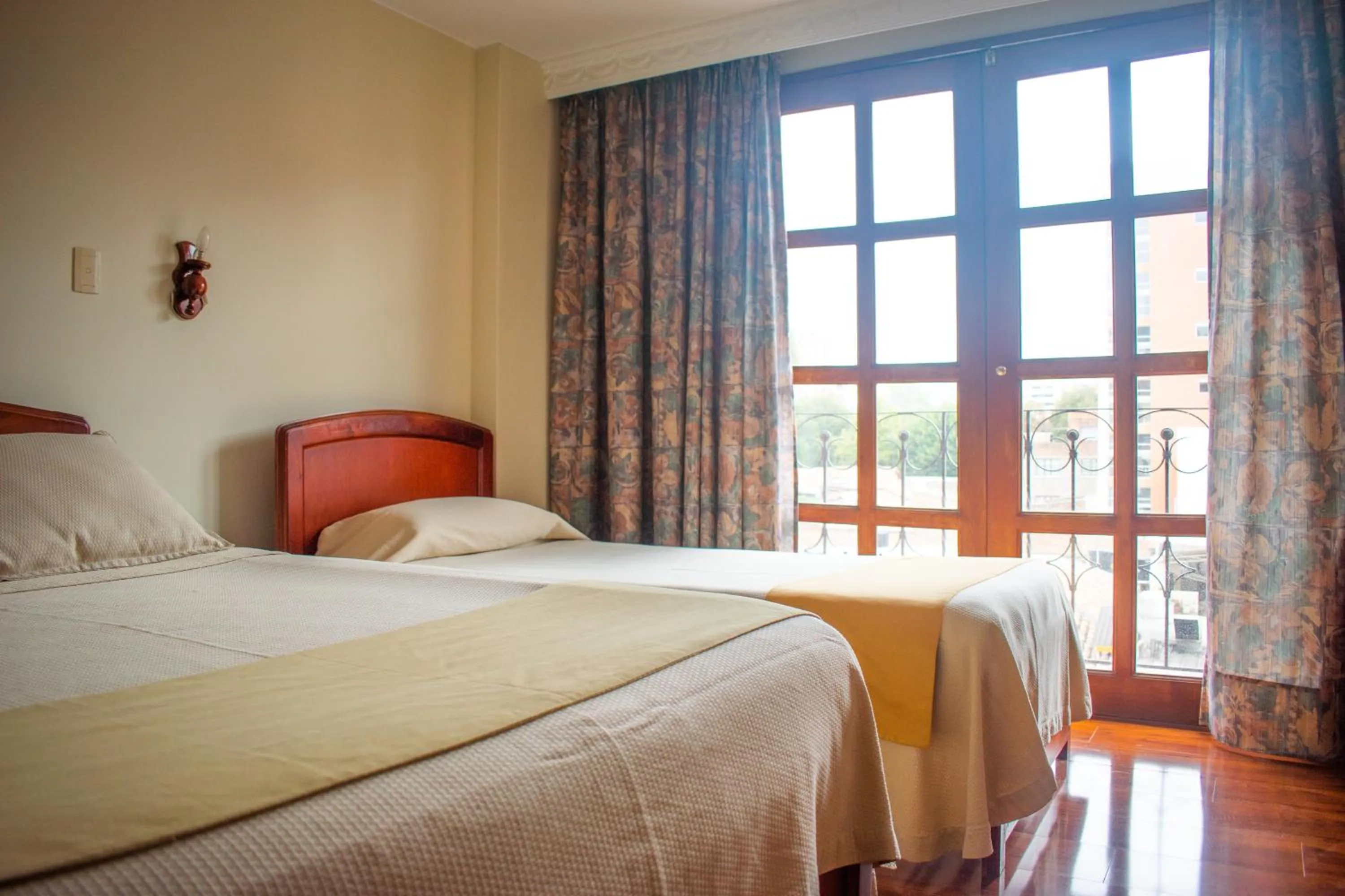 Bed in Hotel Dinastia Real