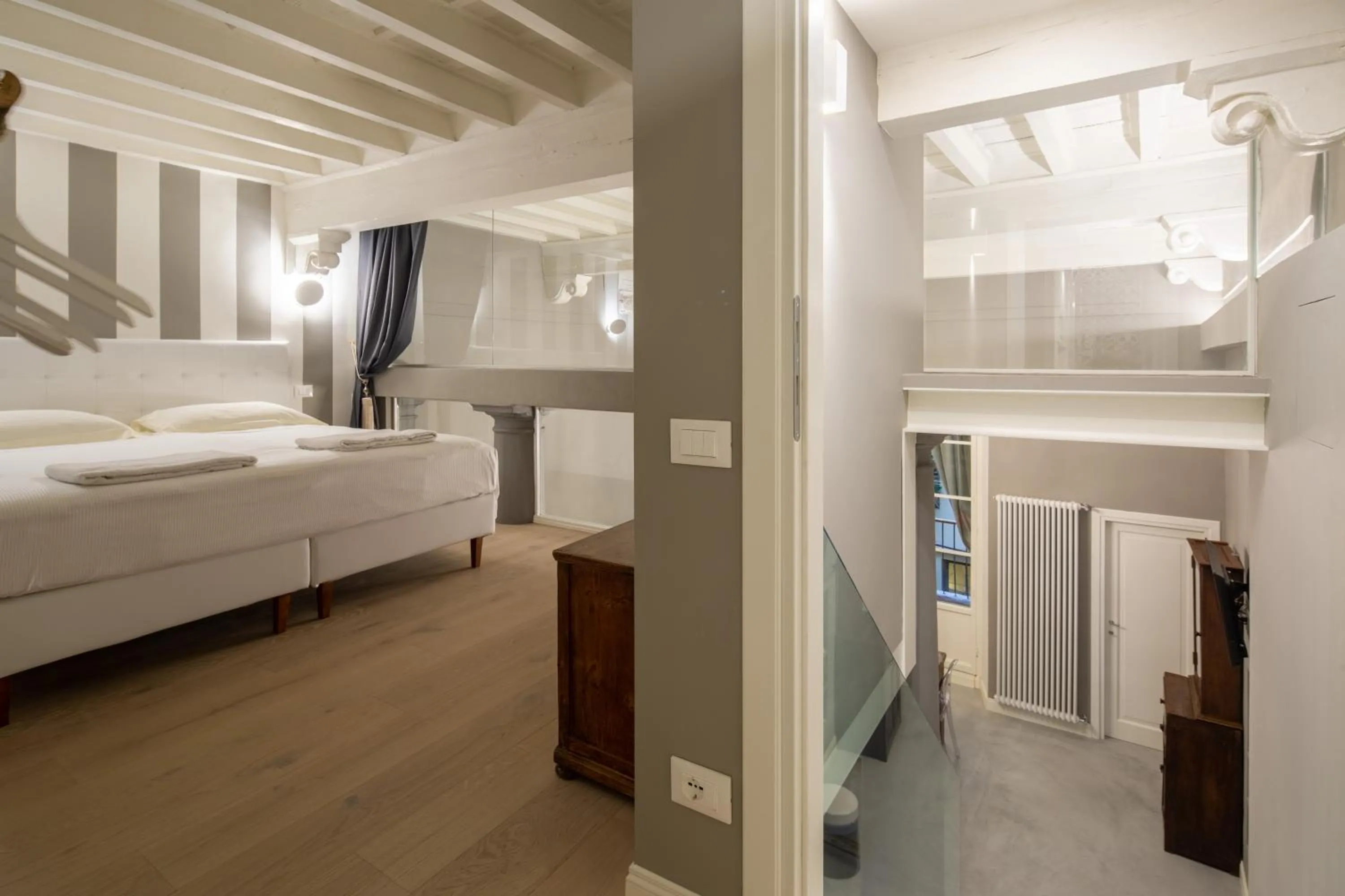 Bed in Casa Velluti Deluxe by Mmega