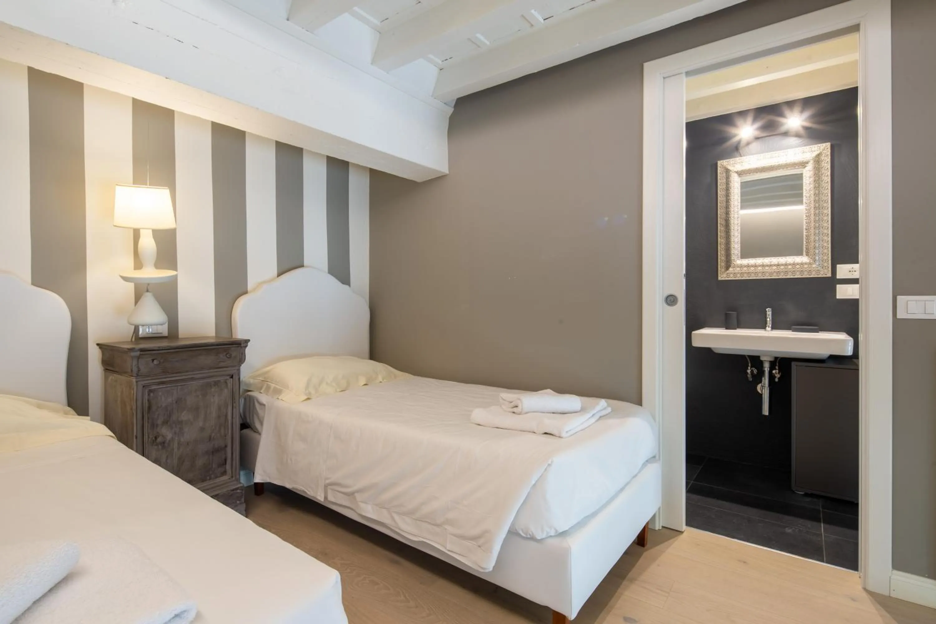 Bed in Casa Velluti Deluxe by Mmega