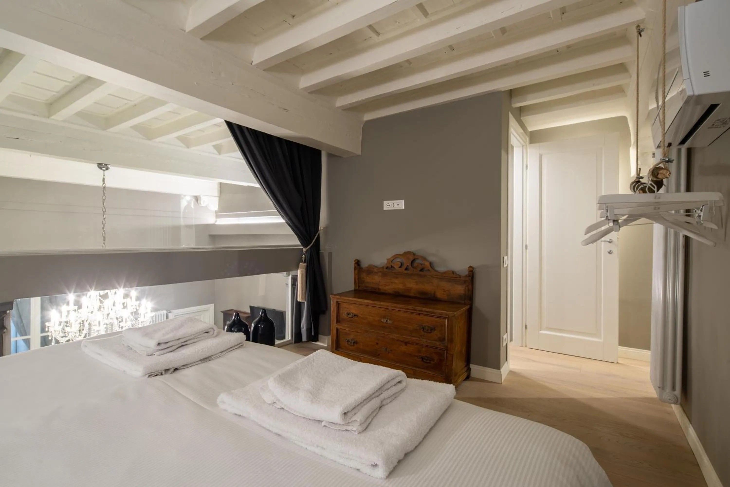 Bed in Casa Velluti Deluxe by Mmega