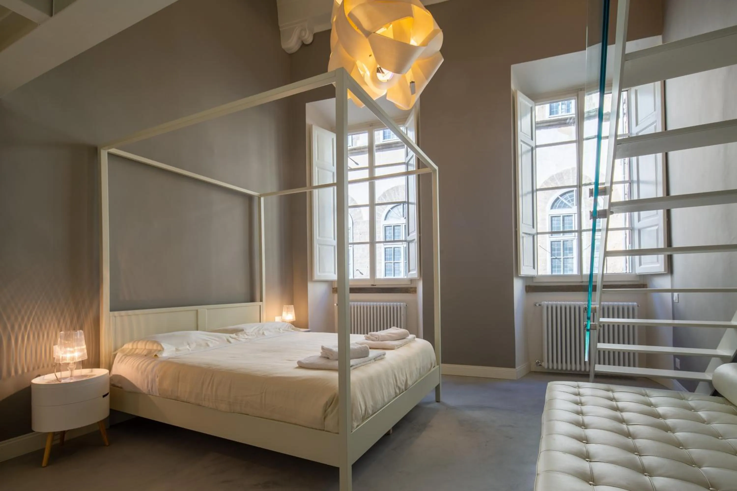 Bed in Casa Velluti Deluxe by Mmega