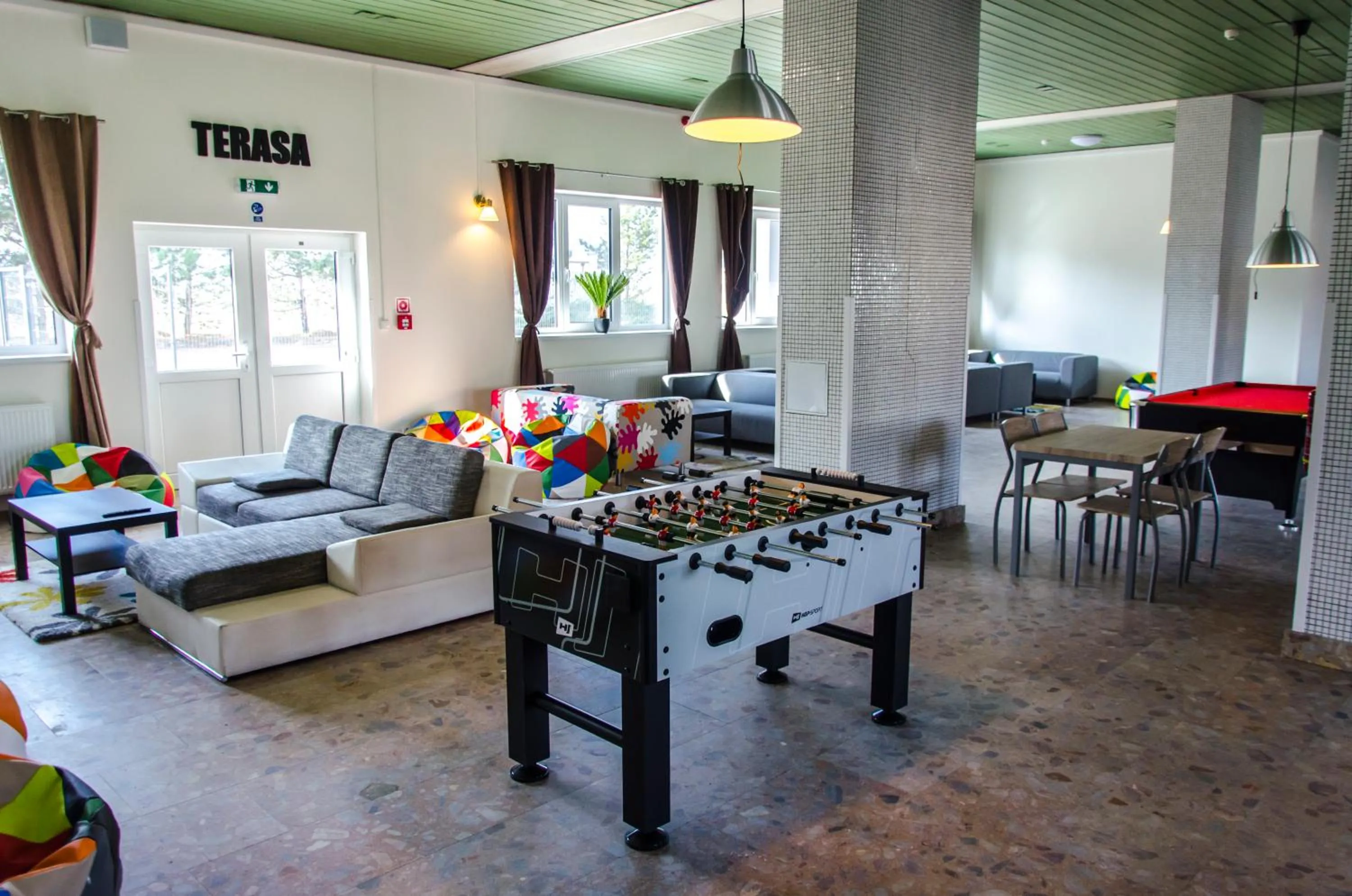 Communal lounge/ TV room in Ubytovňa Milex