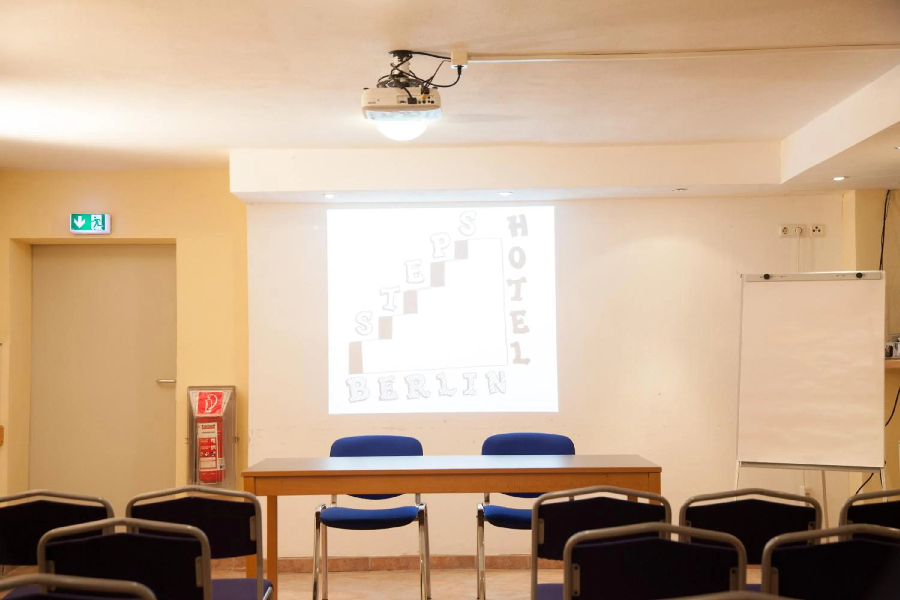 Property logo or sign in Steps-Hotel