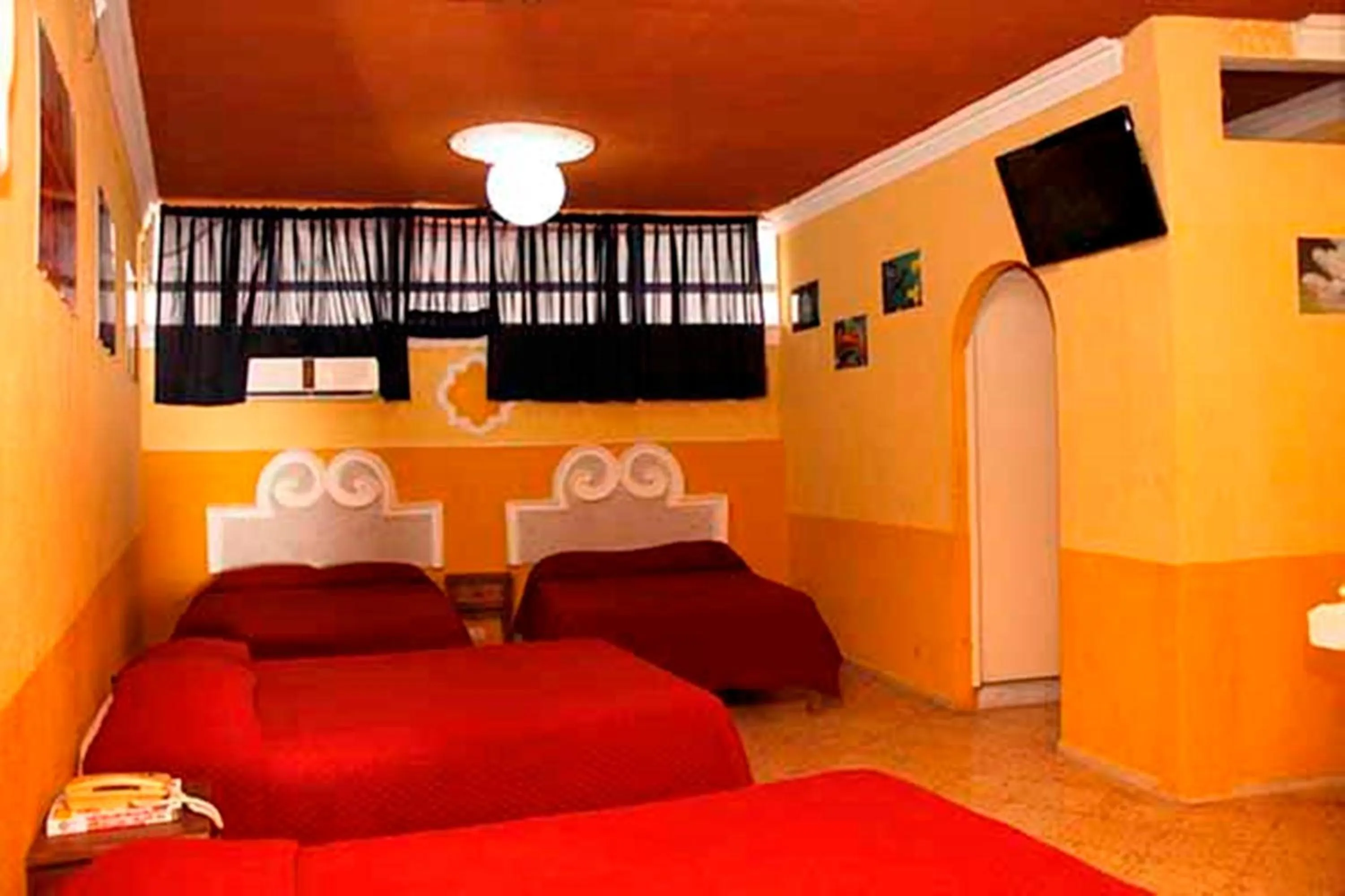 Decorative detail, Bed in Hotel Suites Elia Noemi