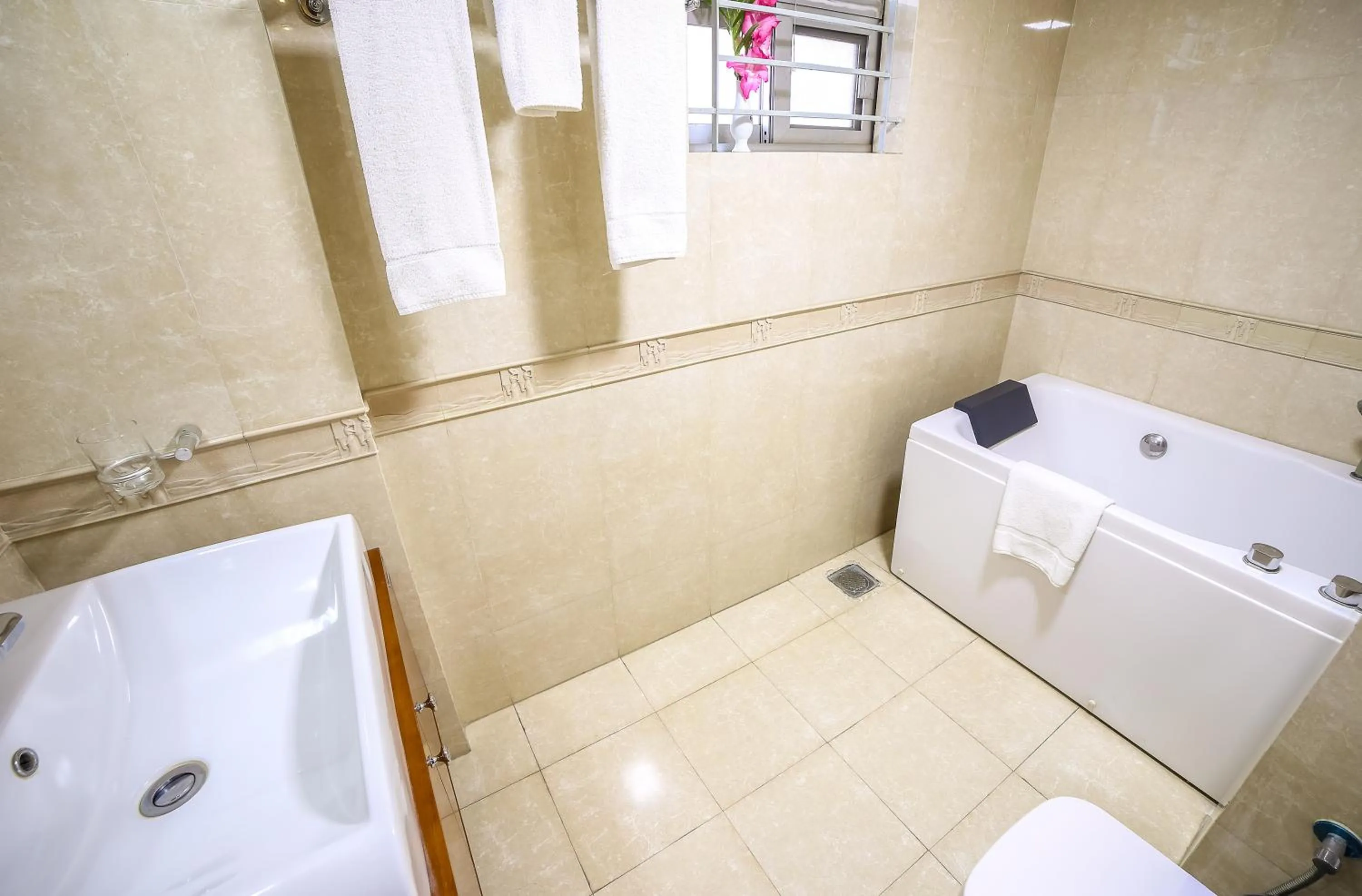 Bathroom in Nascent Gardenia Luxury Suites