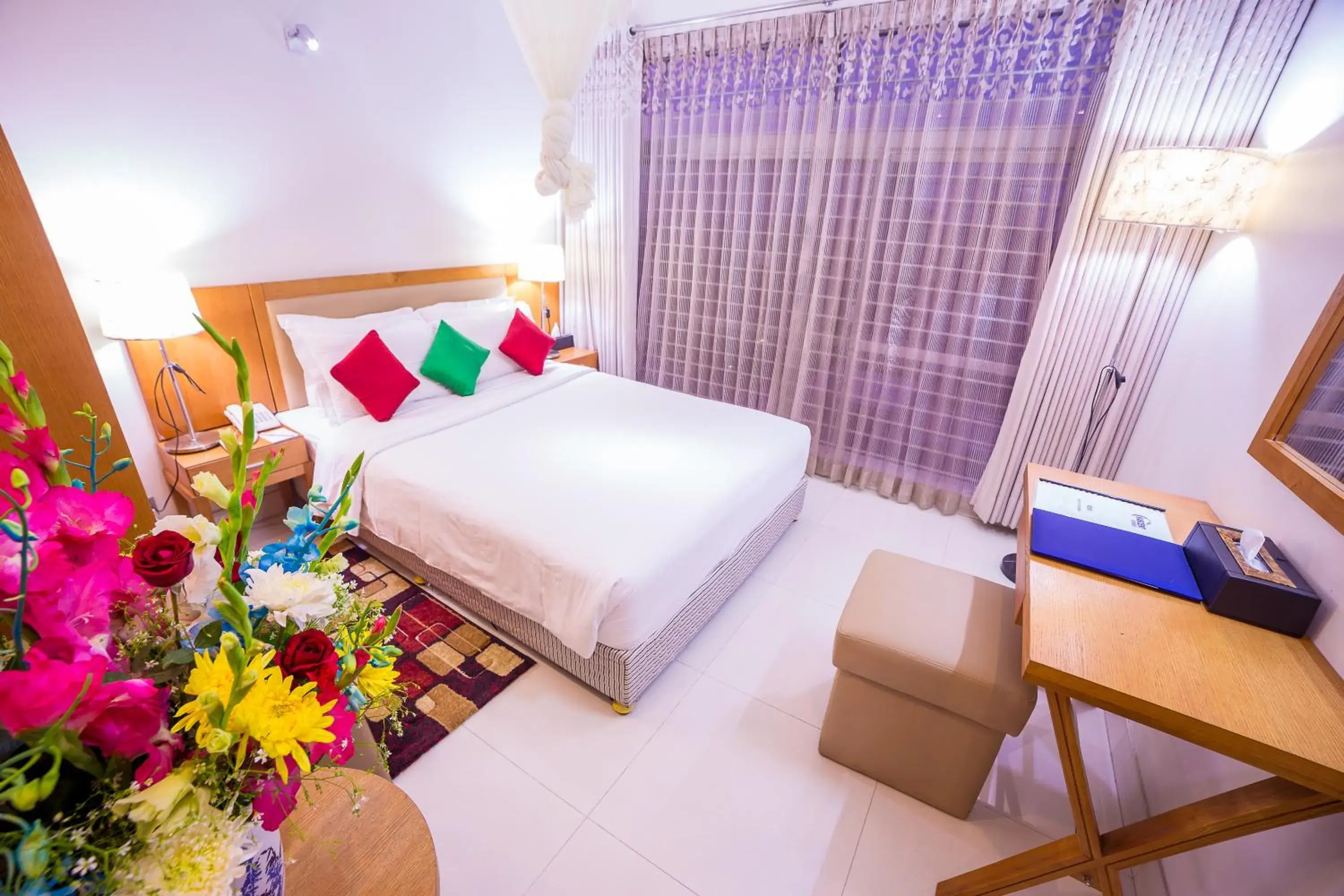 Bed in Nascent Gardenia Luxury Suites Bed in Nascent Gardenia Luxury Suites