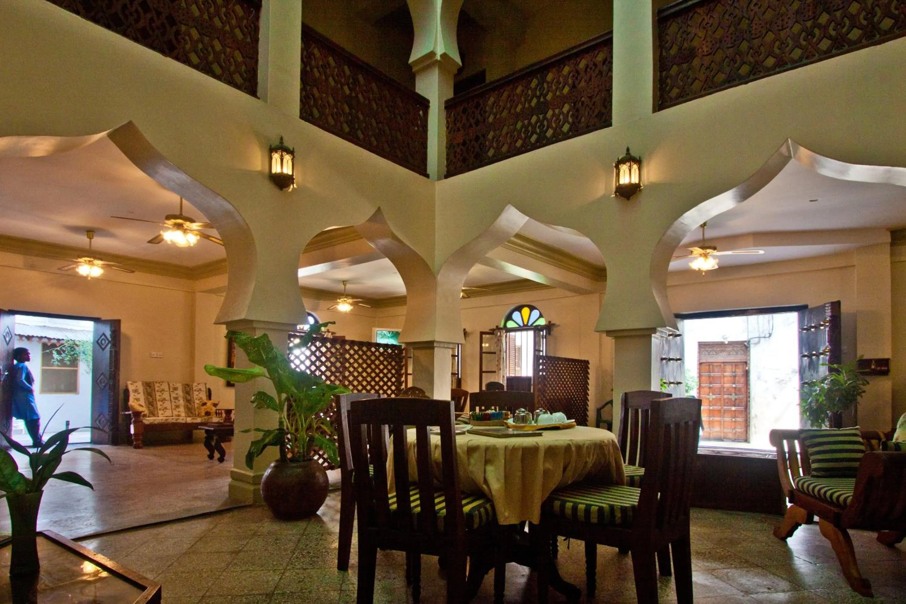 Communal lounge/ TV room in Asmini Palace Hotel