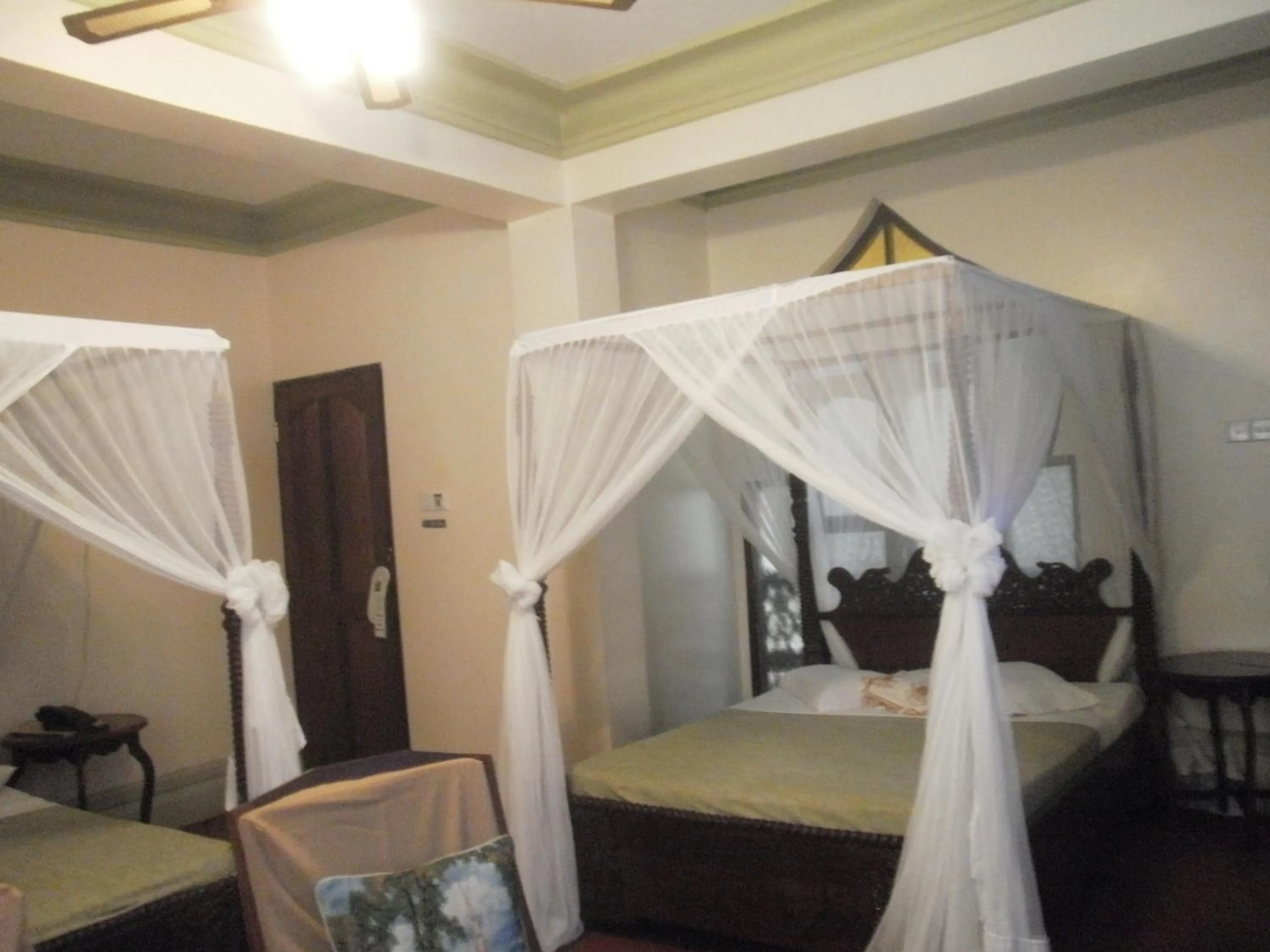 Photo of the whole room, Bed in Asmini Palace Hotel