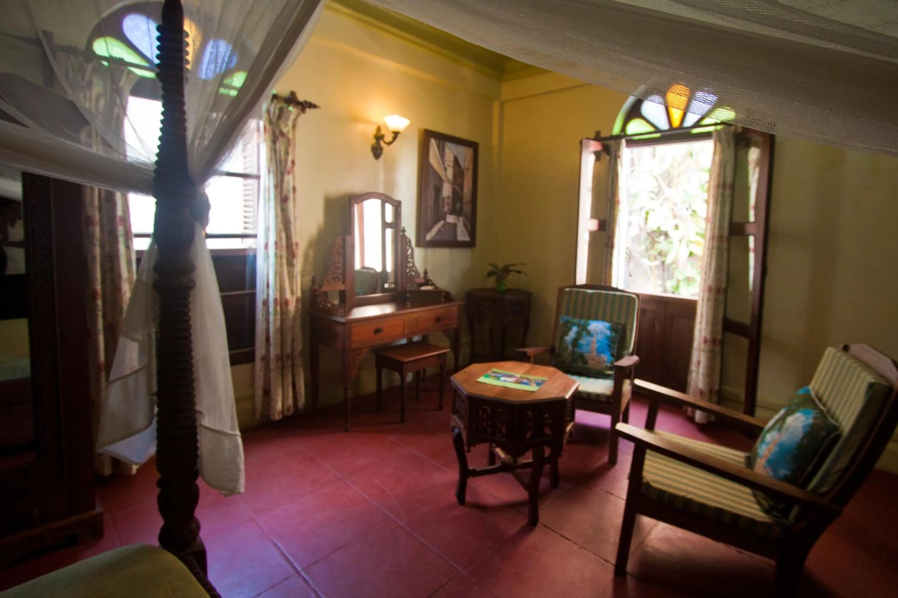 Communal lounge/ TV room in Asmini Palace Hotel